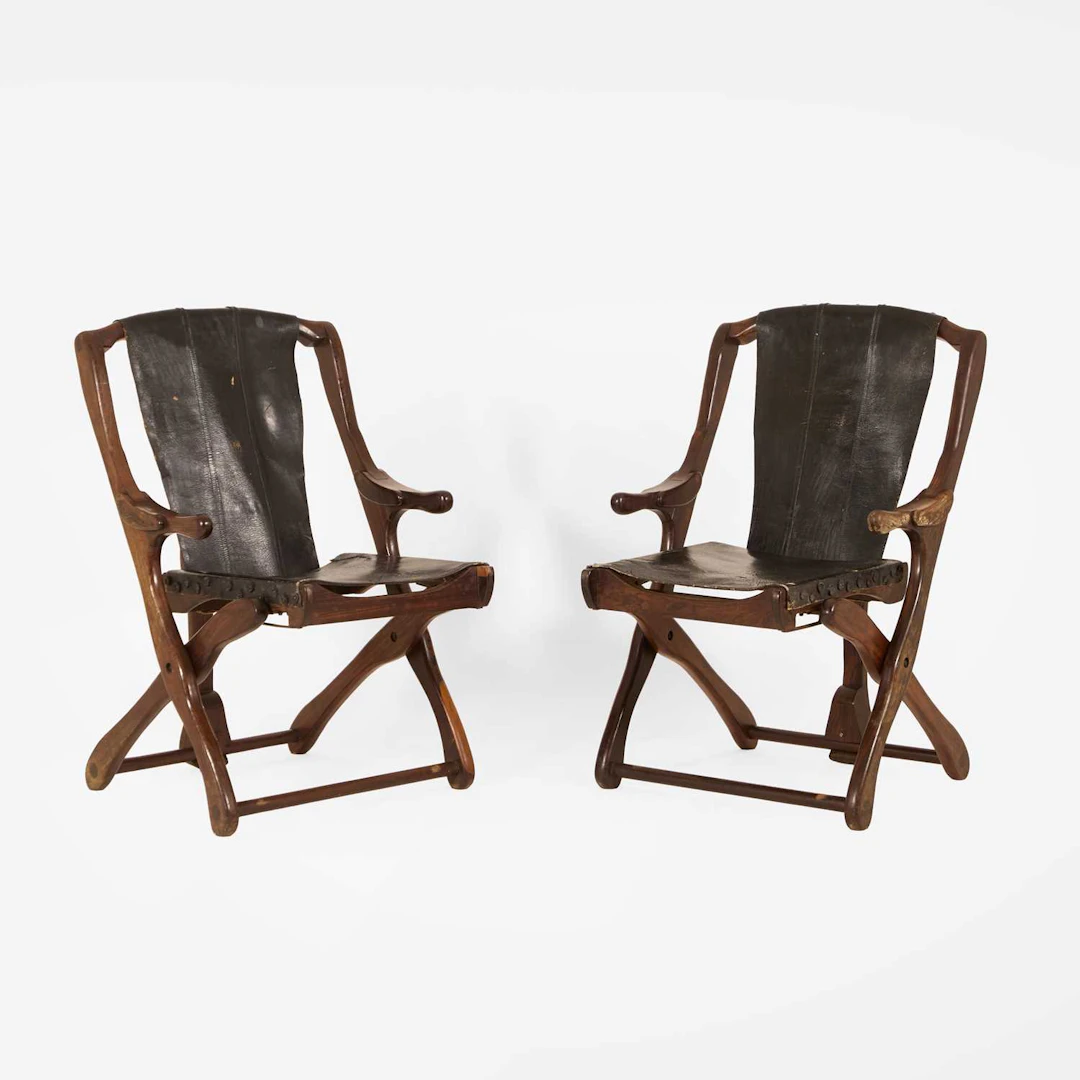 Don Shoemaker (American, 1919-1990) a pair of 'Sling' armchairs