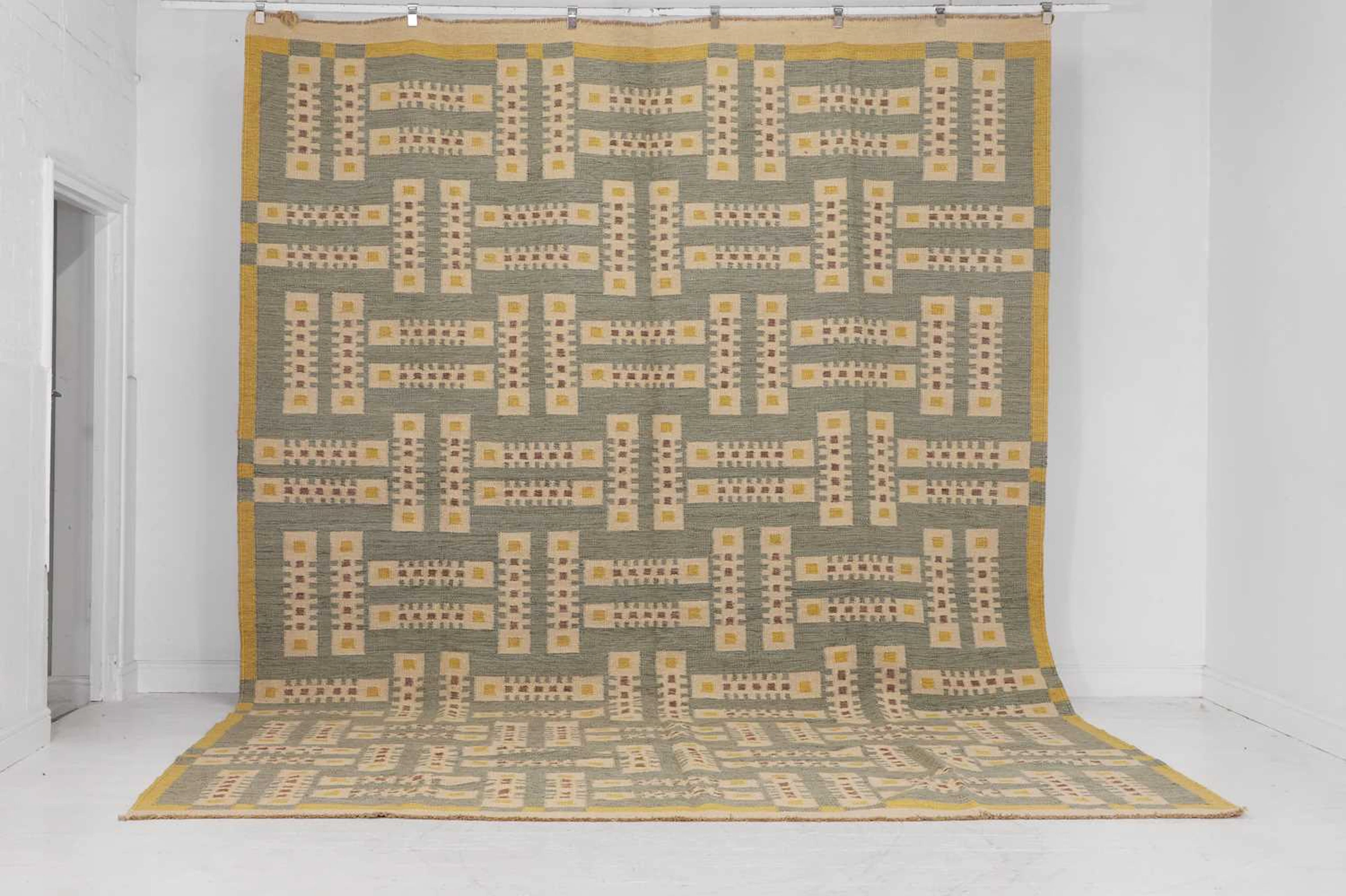 A flat-weave wool carpet of Scandinavian design