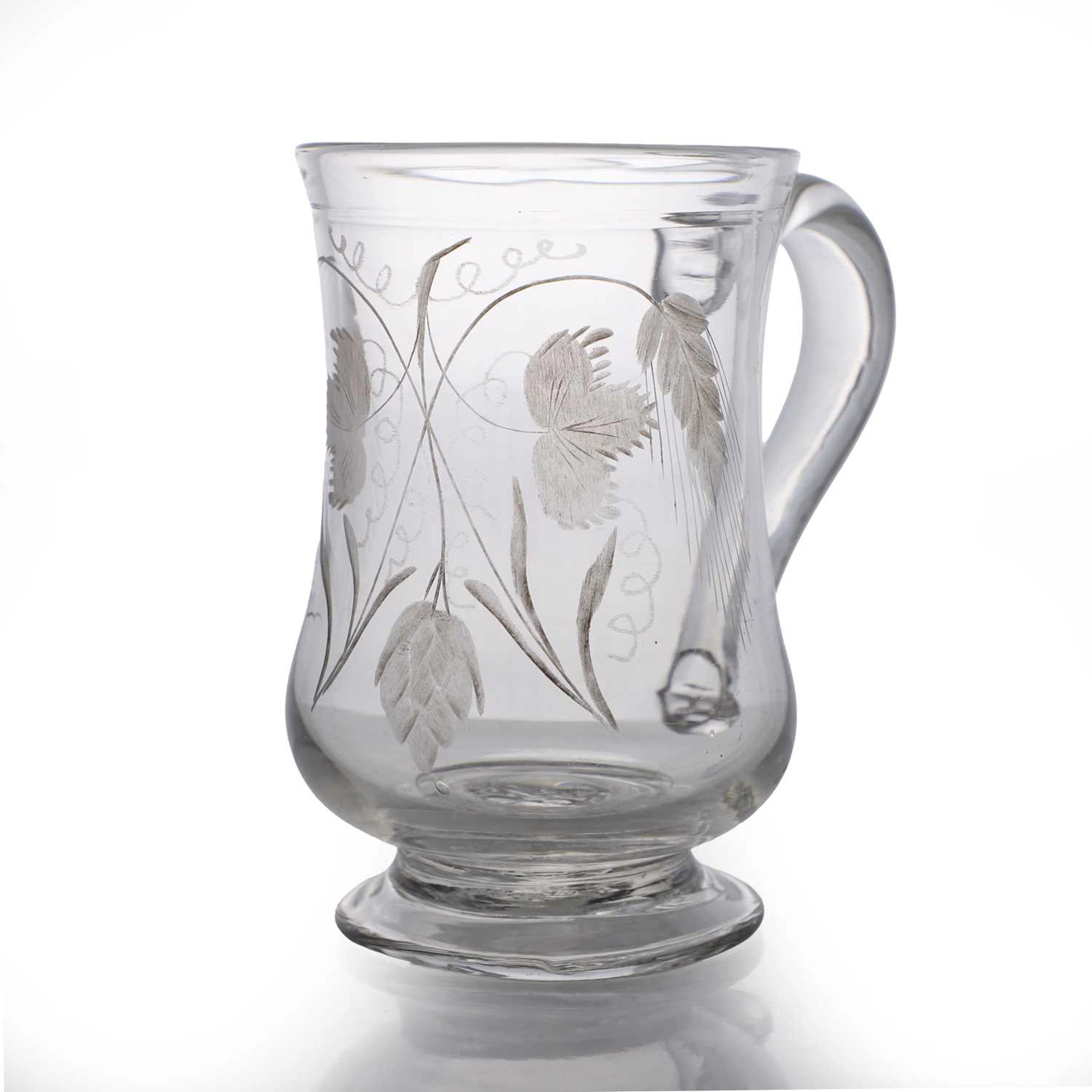An engraved glass mug circa 1780