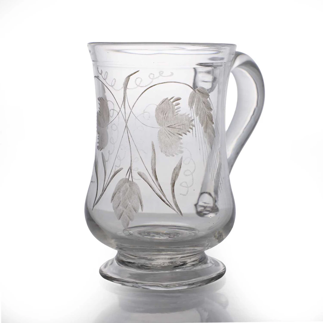 An engraved glass mug circa 1780