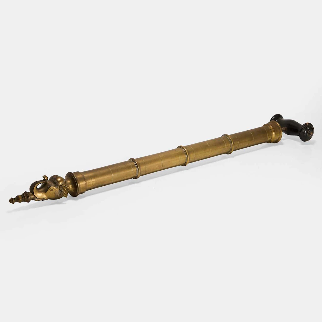 A brass Holi syringe 'abir ki pichkari' late 19th/early 20th century
