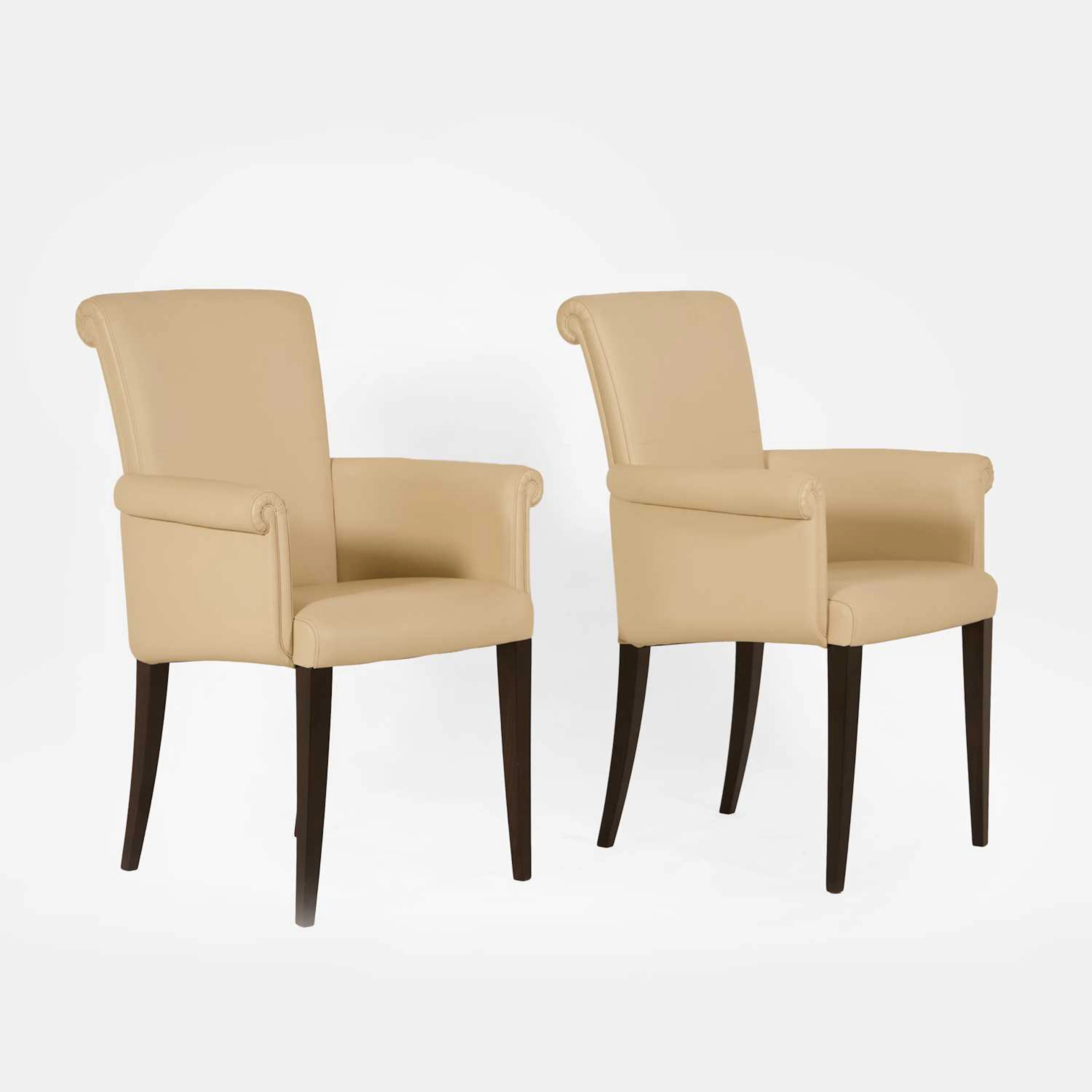 Poltrona Frau a pair of 'Vittoria' armchairs