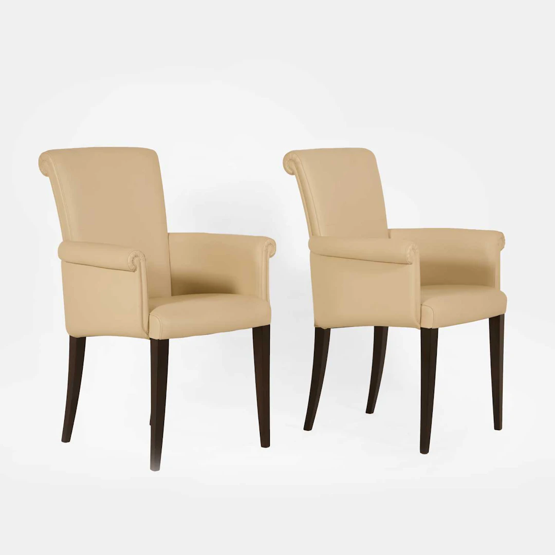 Poltrona Frau a pair of 'Vittoria' armchairs