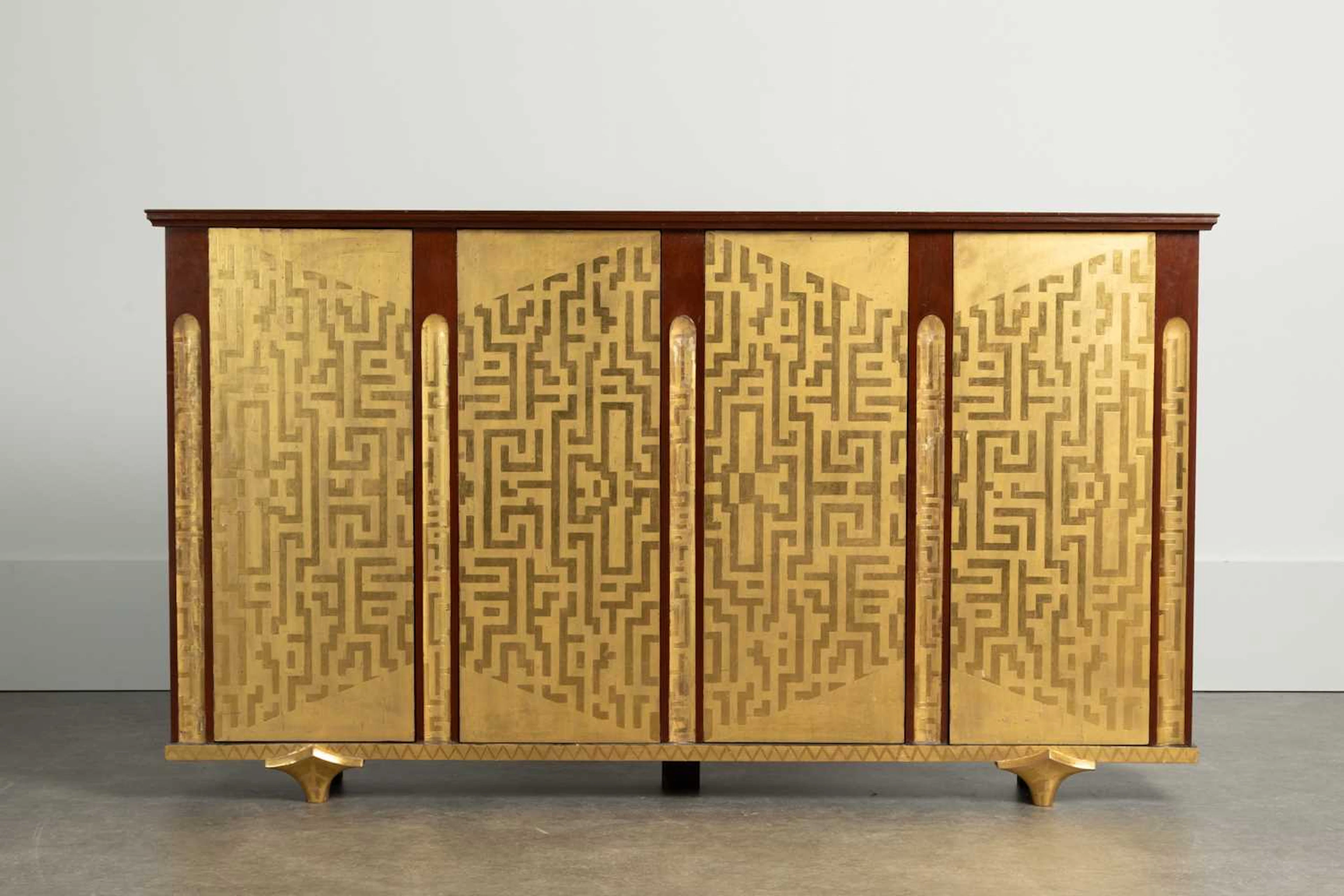 A palm-veneered, redwood and ebonised cabinet