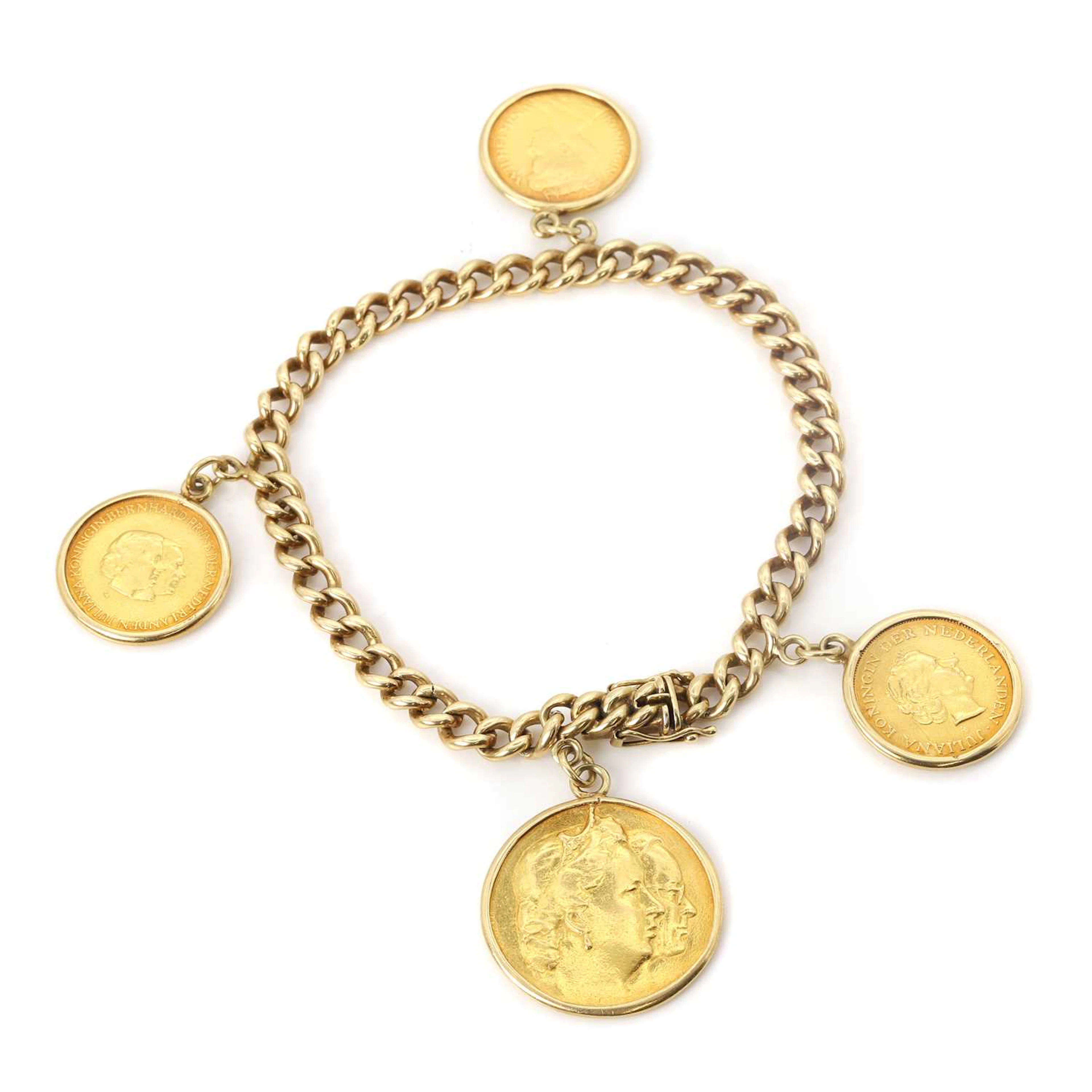 A gold curb link coin charm bracelet