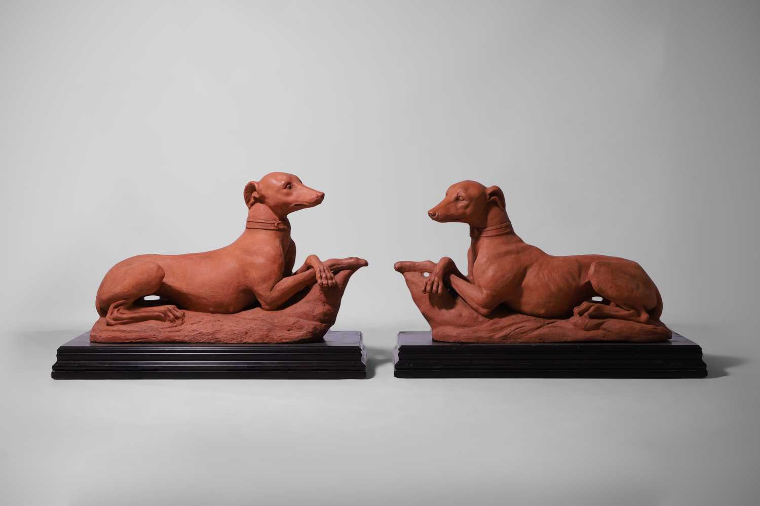 A pair of terracotta whippets late 19th century, Italian