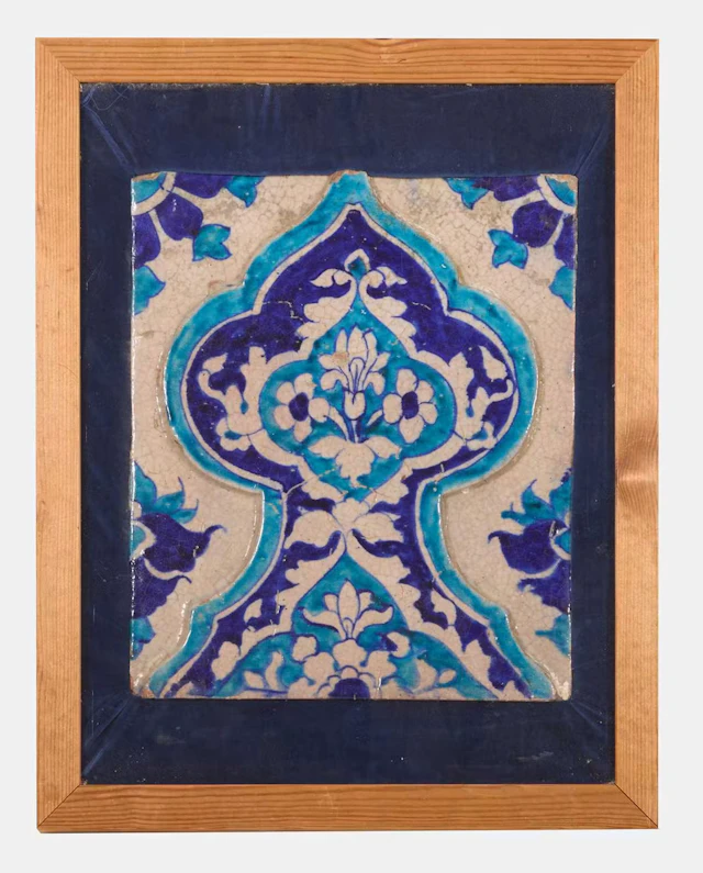 A Multan moulded cobalt-blue and turquoise glazed tile panel 19th