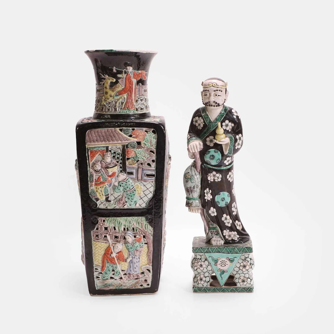 Two Chinese famille noire and biscuit porcelain pieces