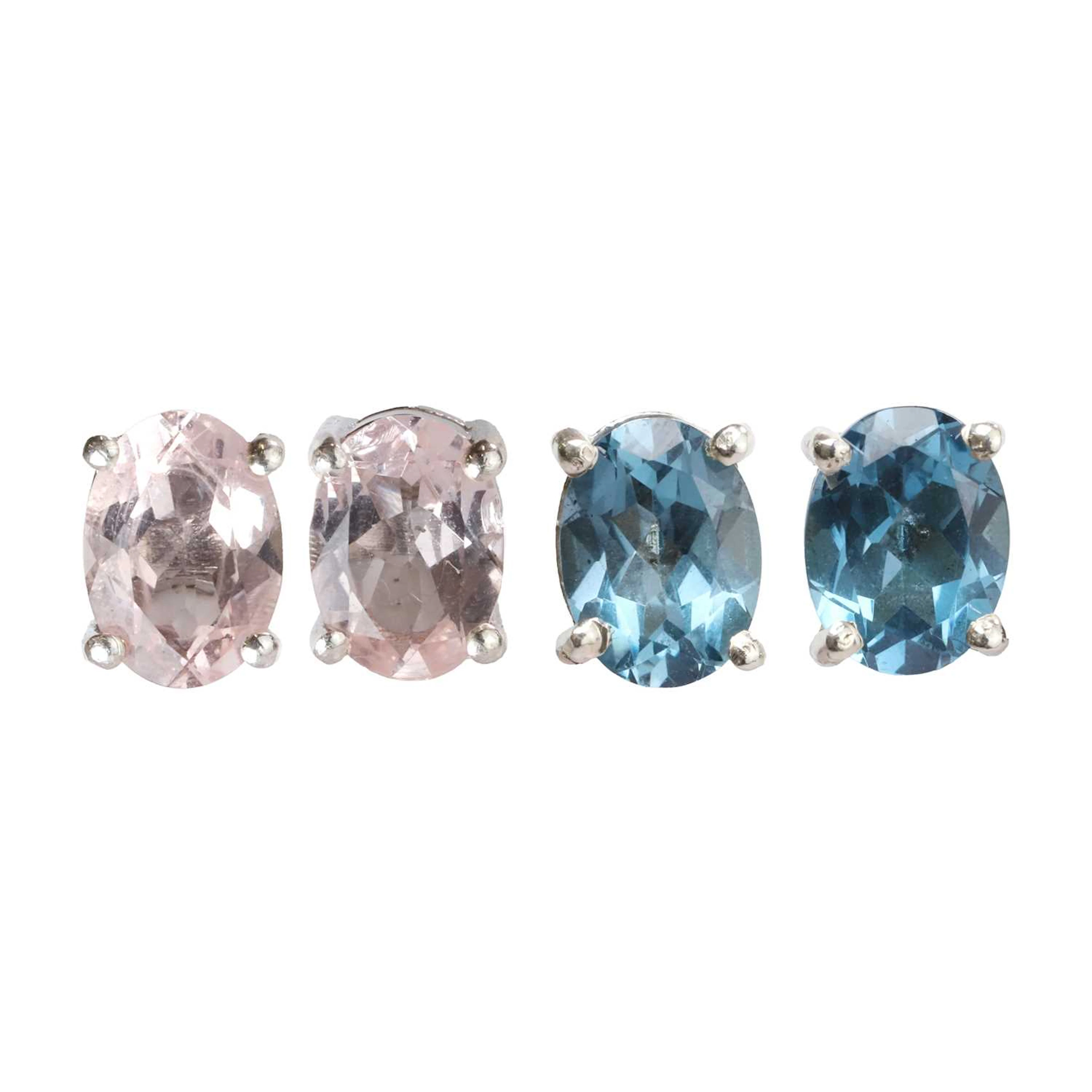 Two pairs of silver gemstone set stud earrings
