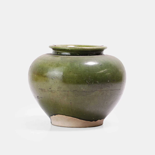 A Chinese earthenware jar Tang dynasty (618-907)