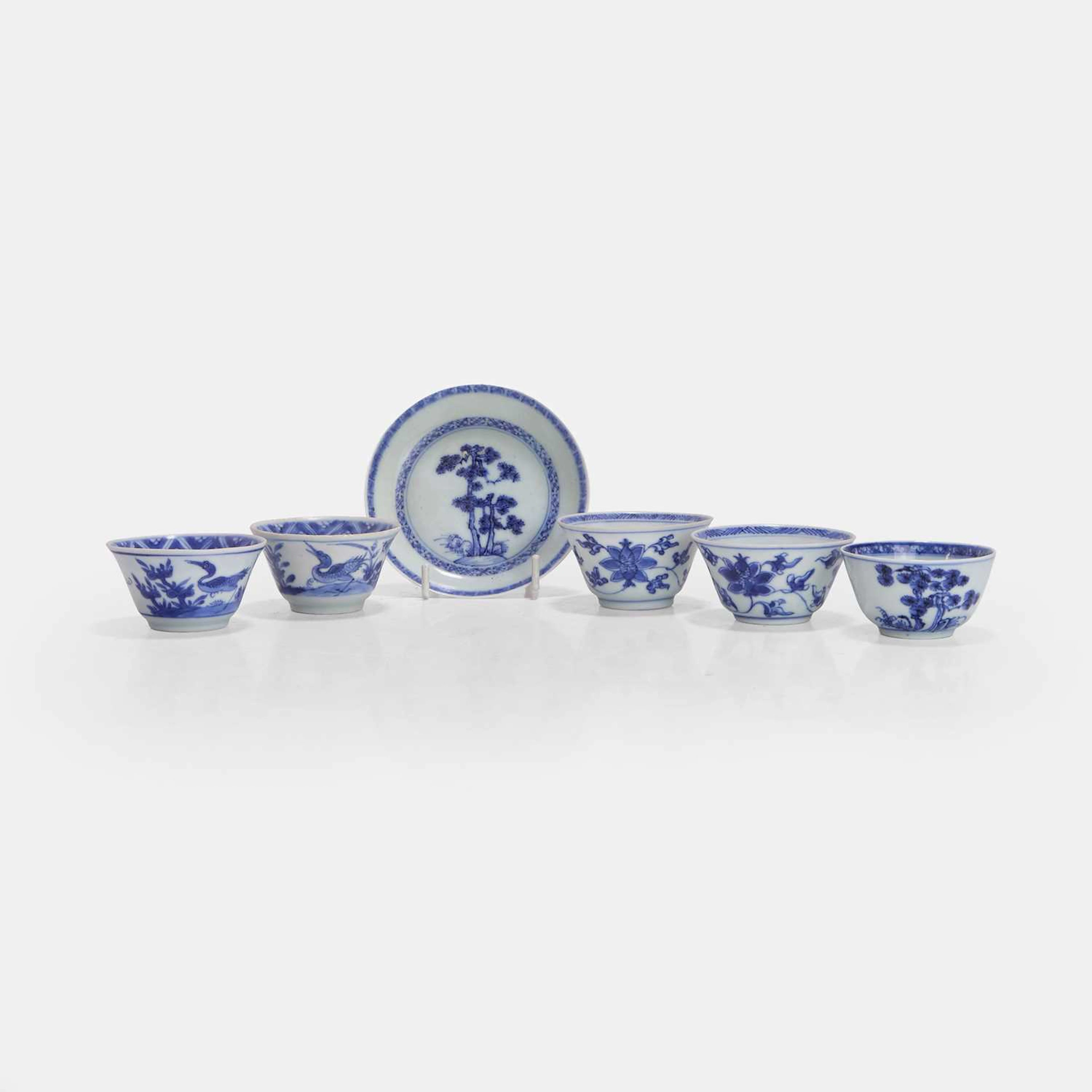 A collection of Chinese blue and white cups and saucers 18th century