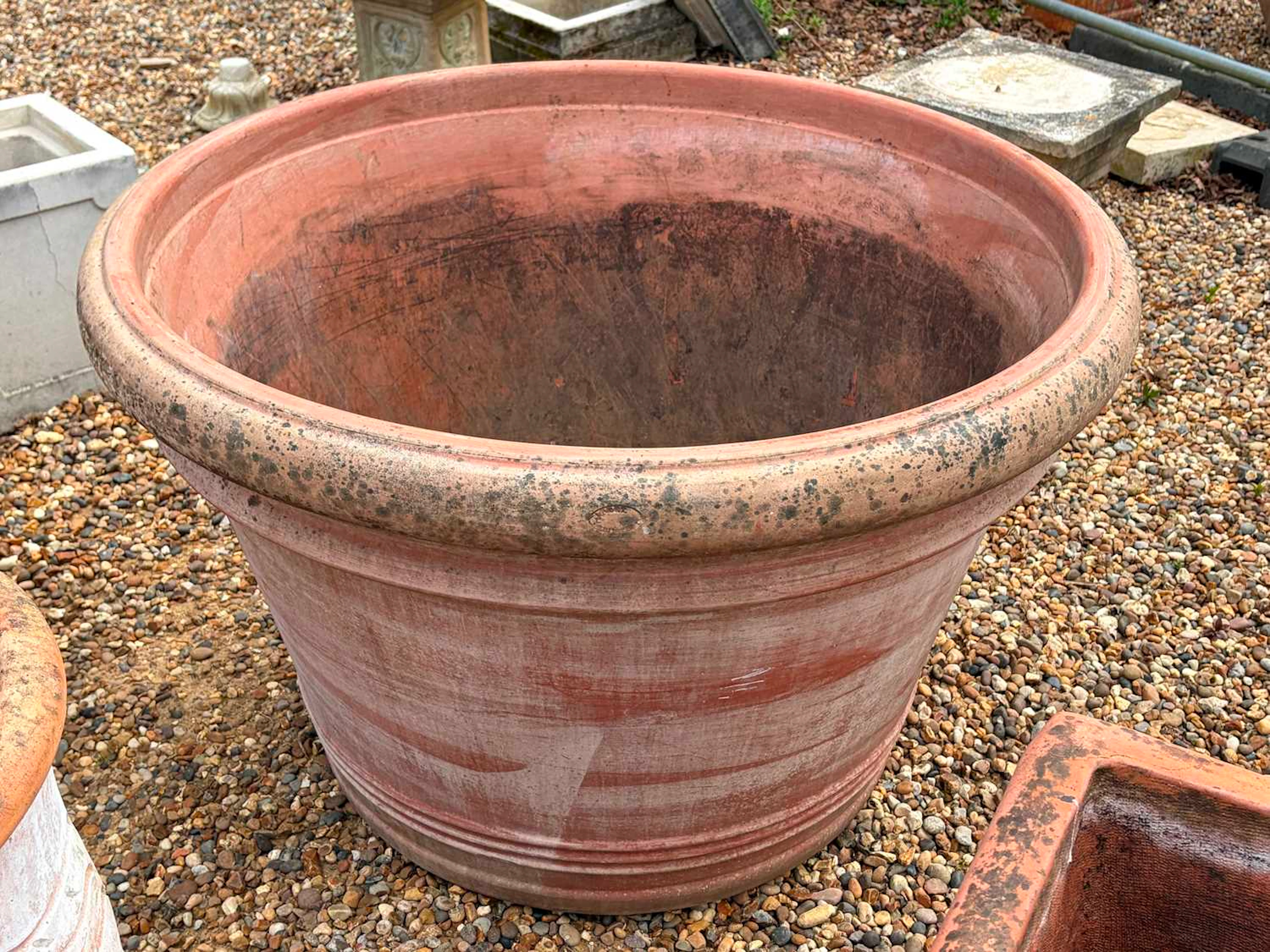 A large terracotta planter of modern manufacture