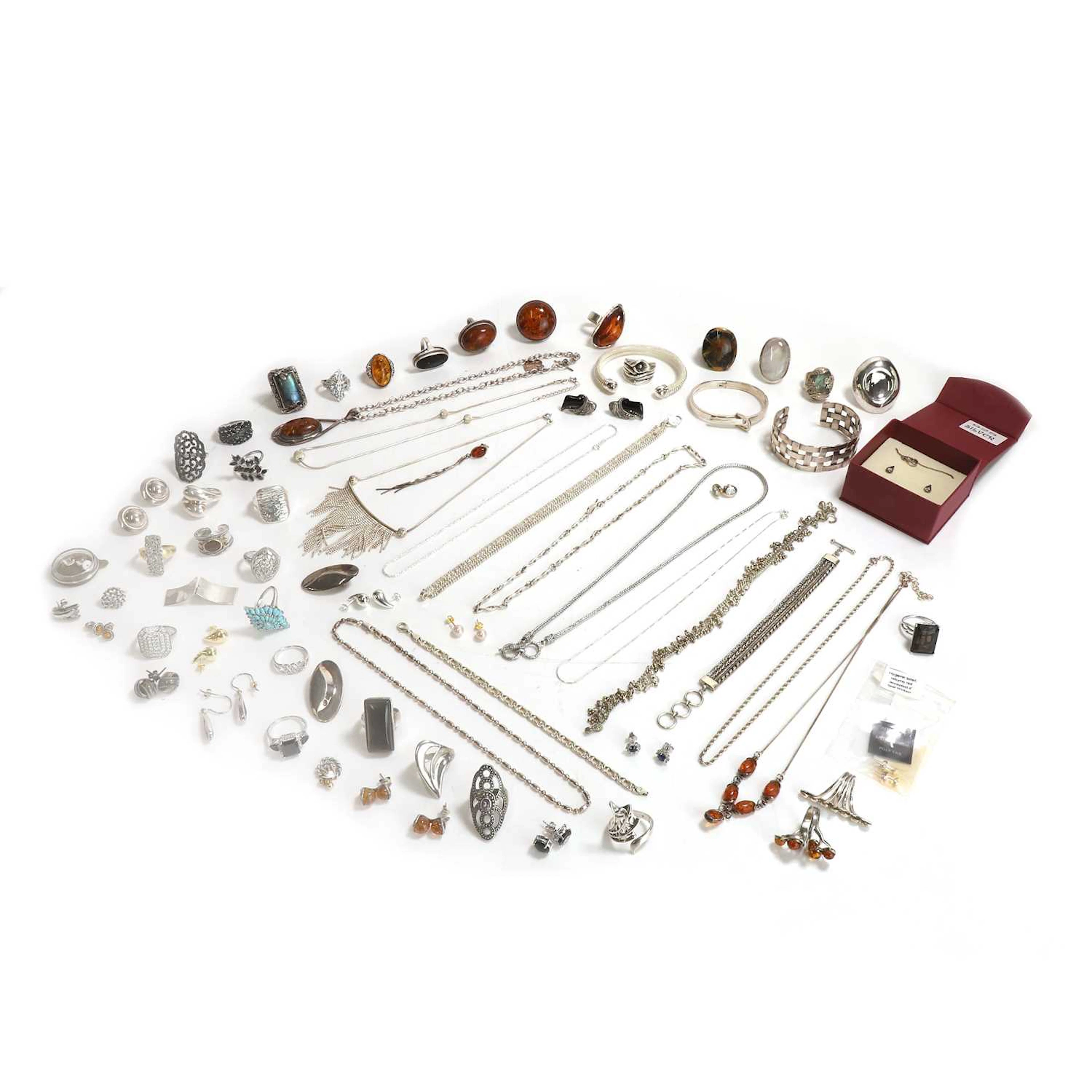 A large group of silver jewellery