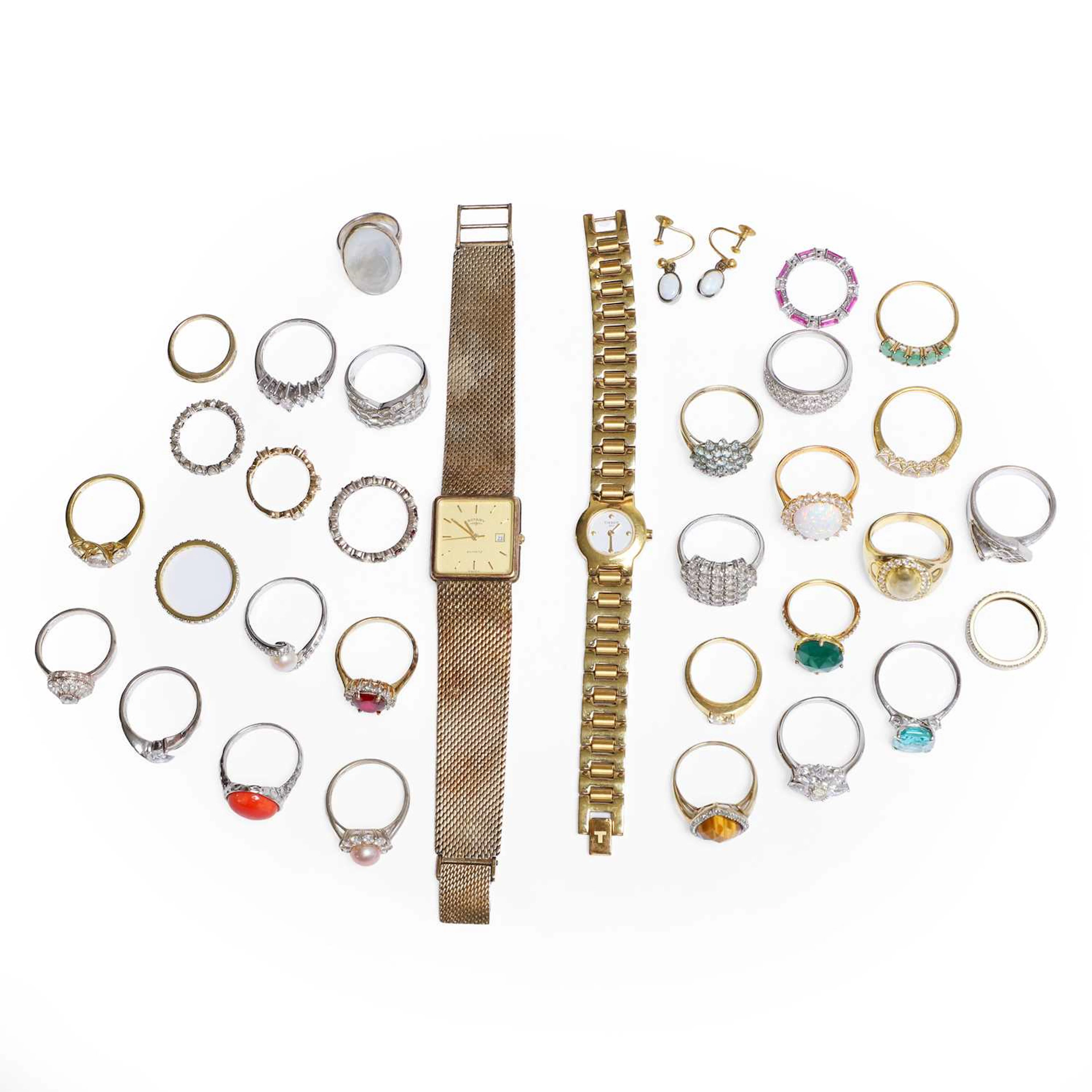 A collection of gold and silver rings and two quartz watches