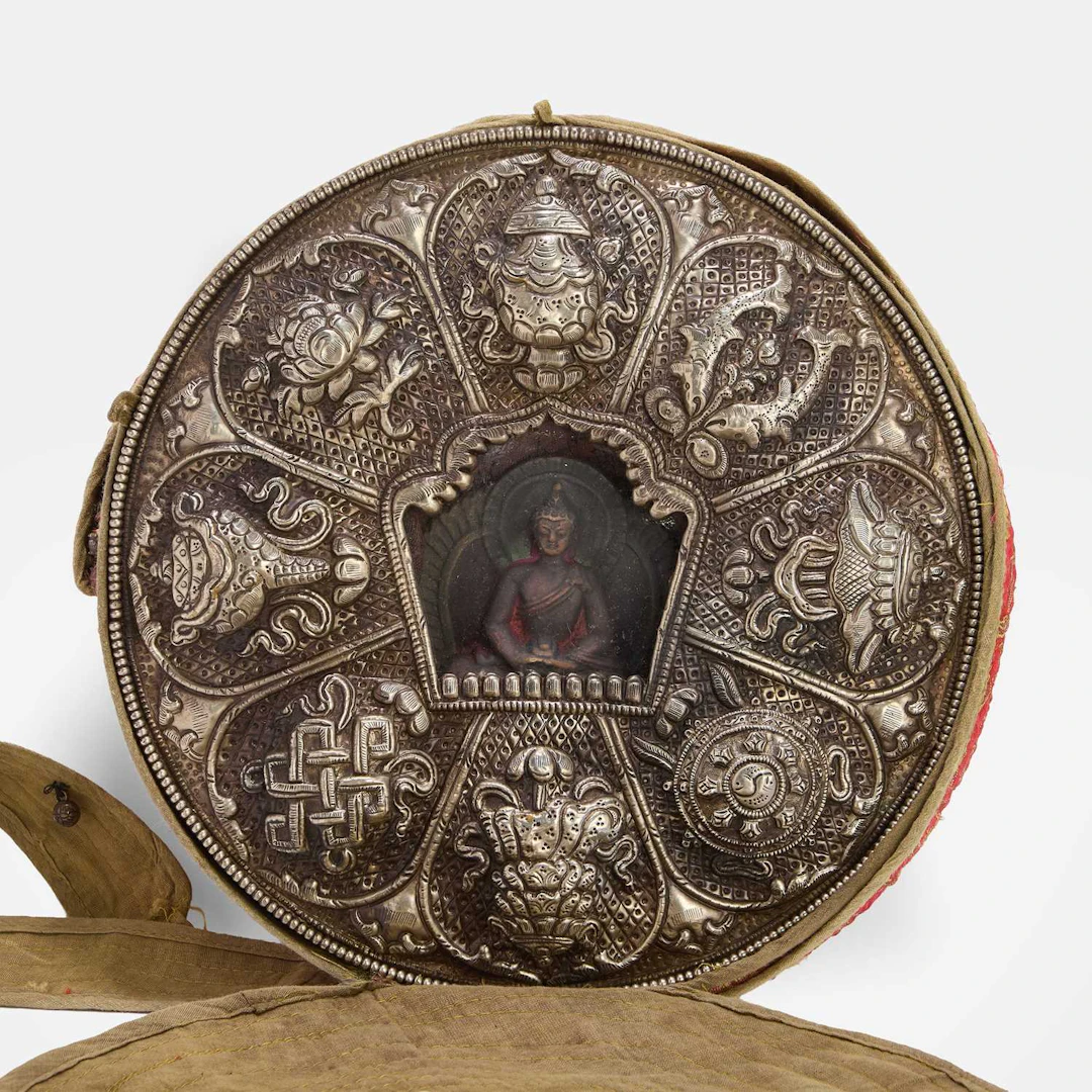 A large Tibetan white-metal and copper portable gau shrine 19th century