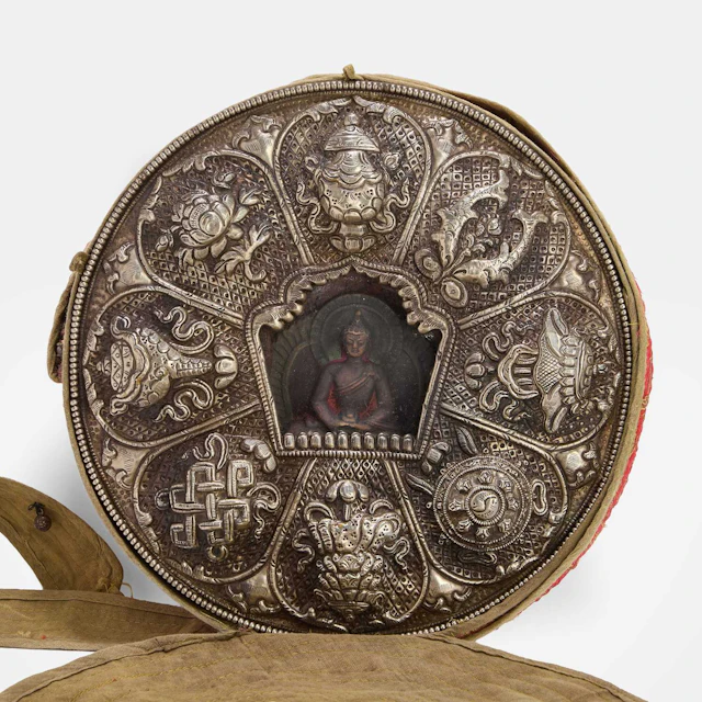 A large Tibetan white-metal and copper portable gau shrine 19th century