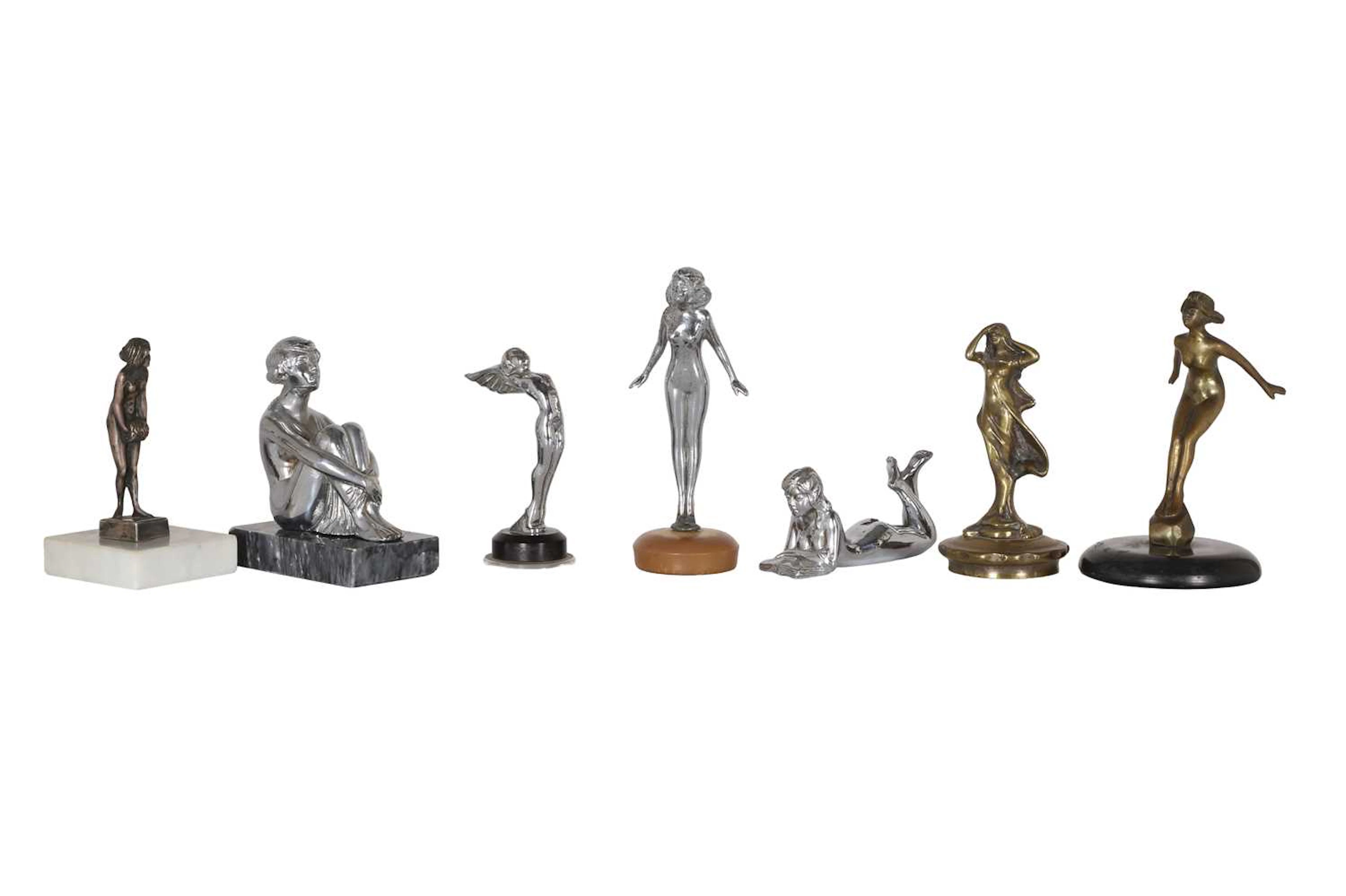 A group of figural mascots early 20th century and later