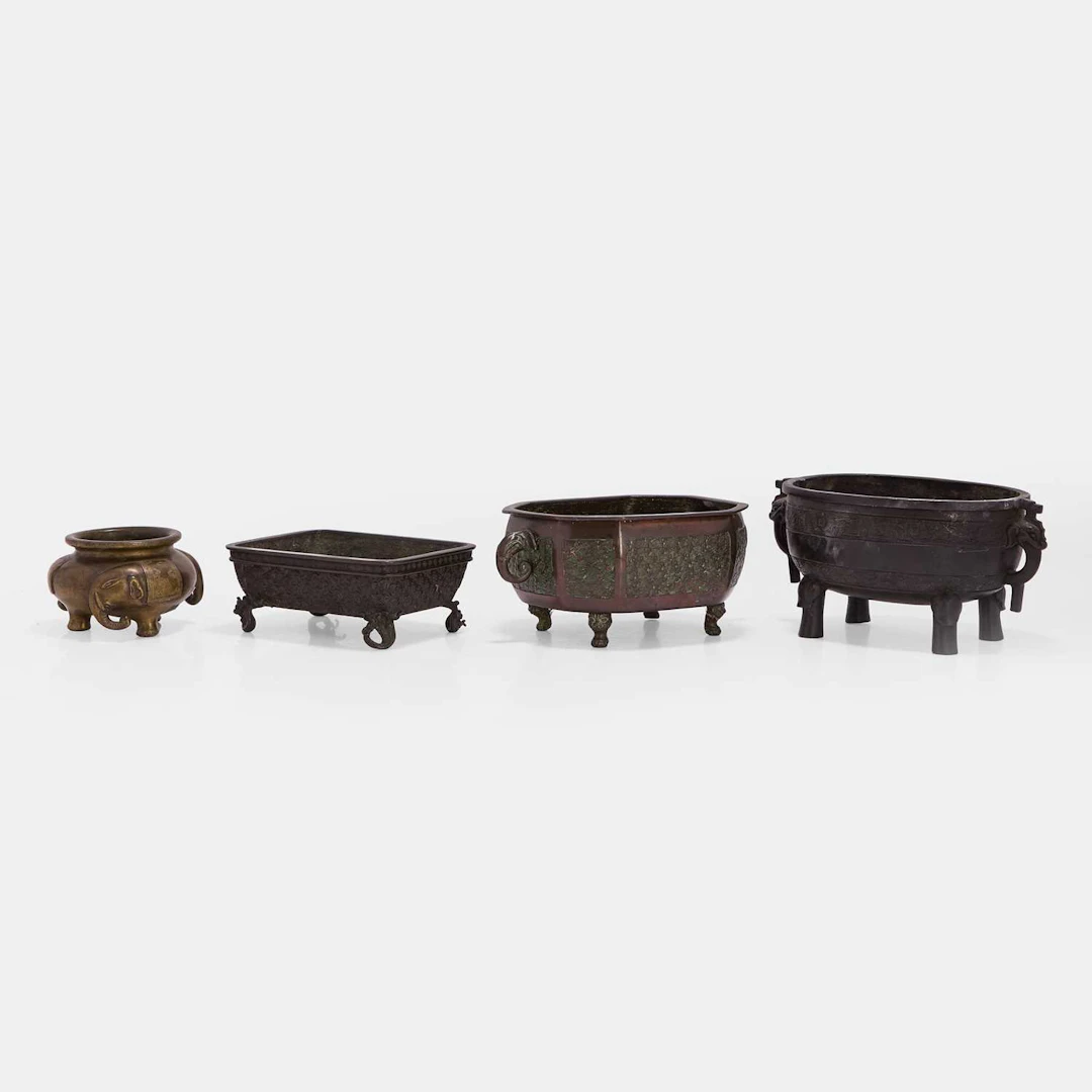 A group of four Japanese bronze koro 20th century