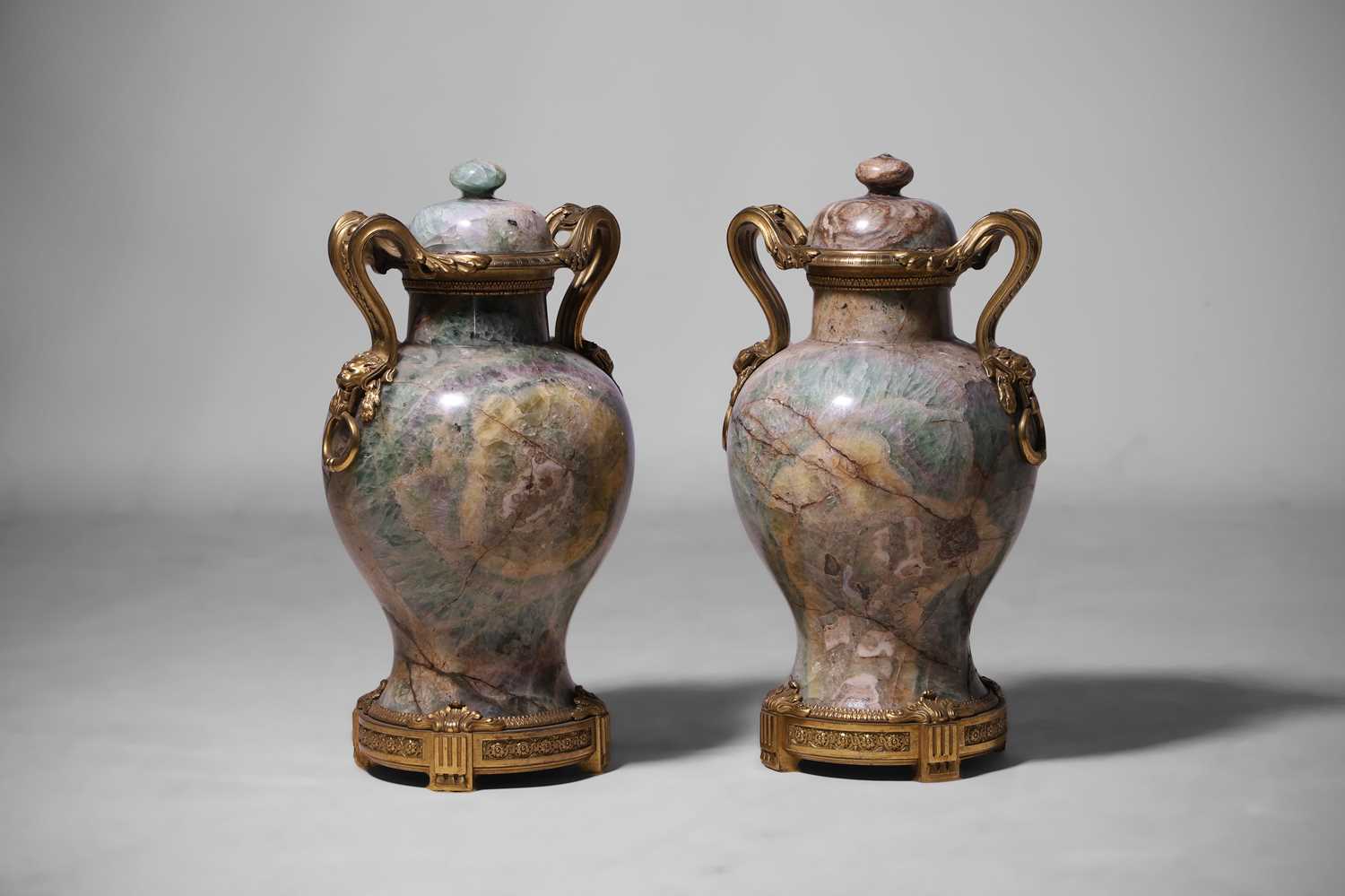 A pair of Louis XV-style green fluorspar and ormolu vases second half