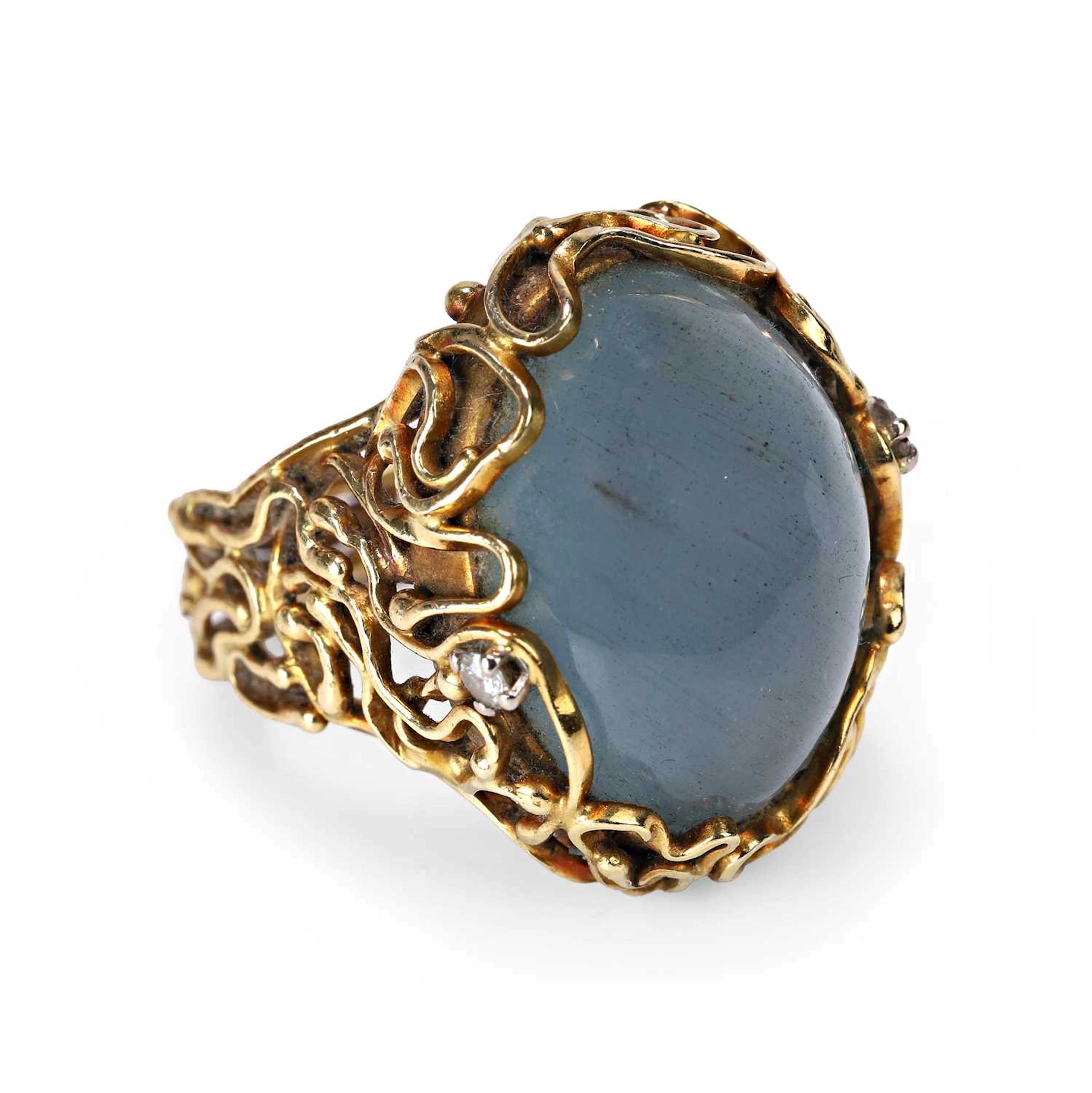 An 18ct gold aquamarine and diamond ring circa 1969