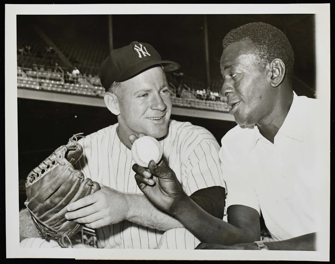 "1961 Whitey Ford and Satchel Paige photograph (EX/MT)...
