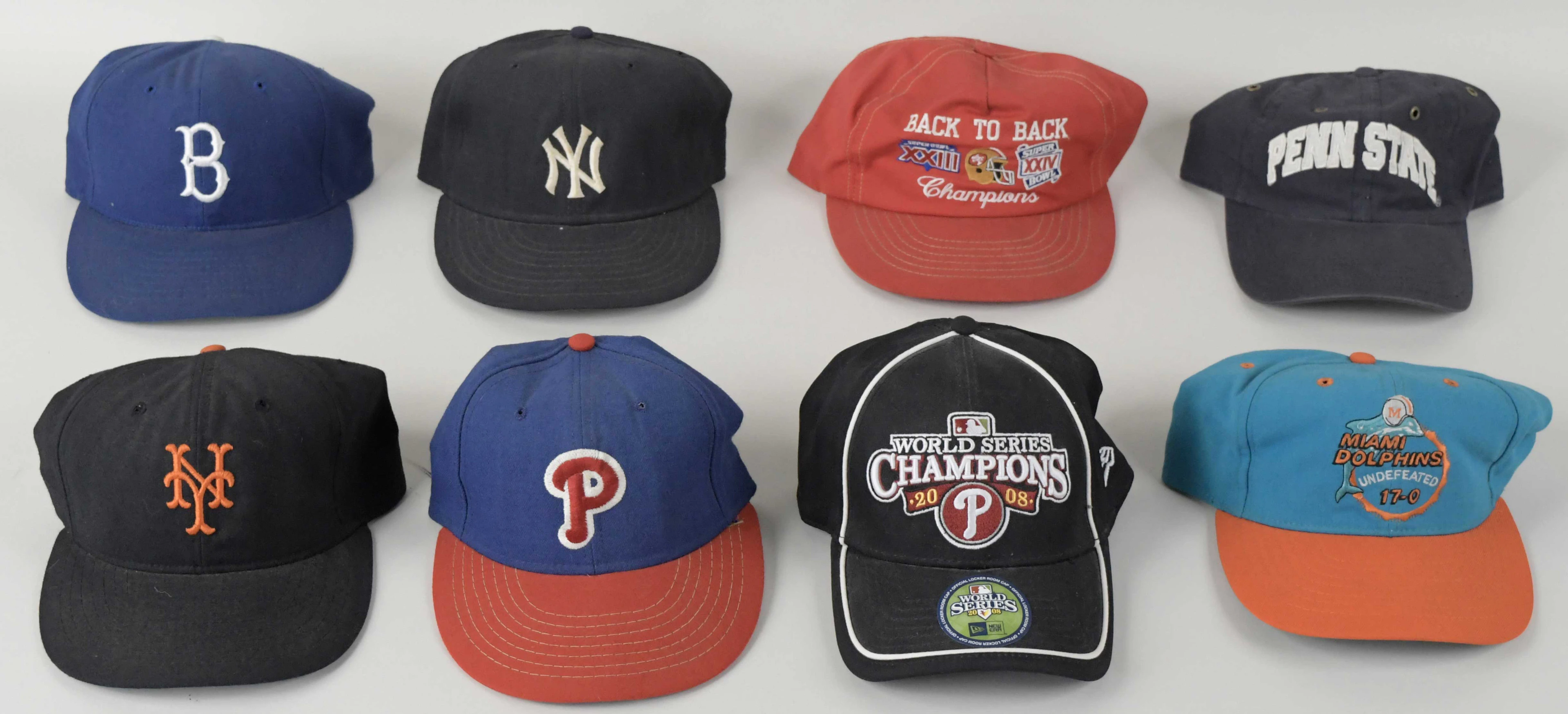 "Multi-sport lot of (40) assorted retail model baseball caps