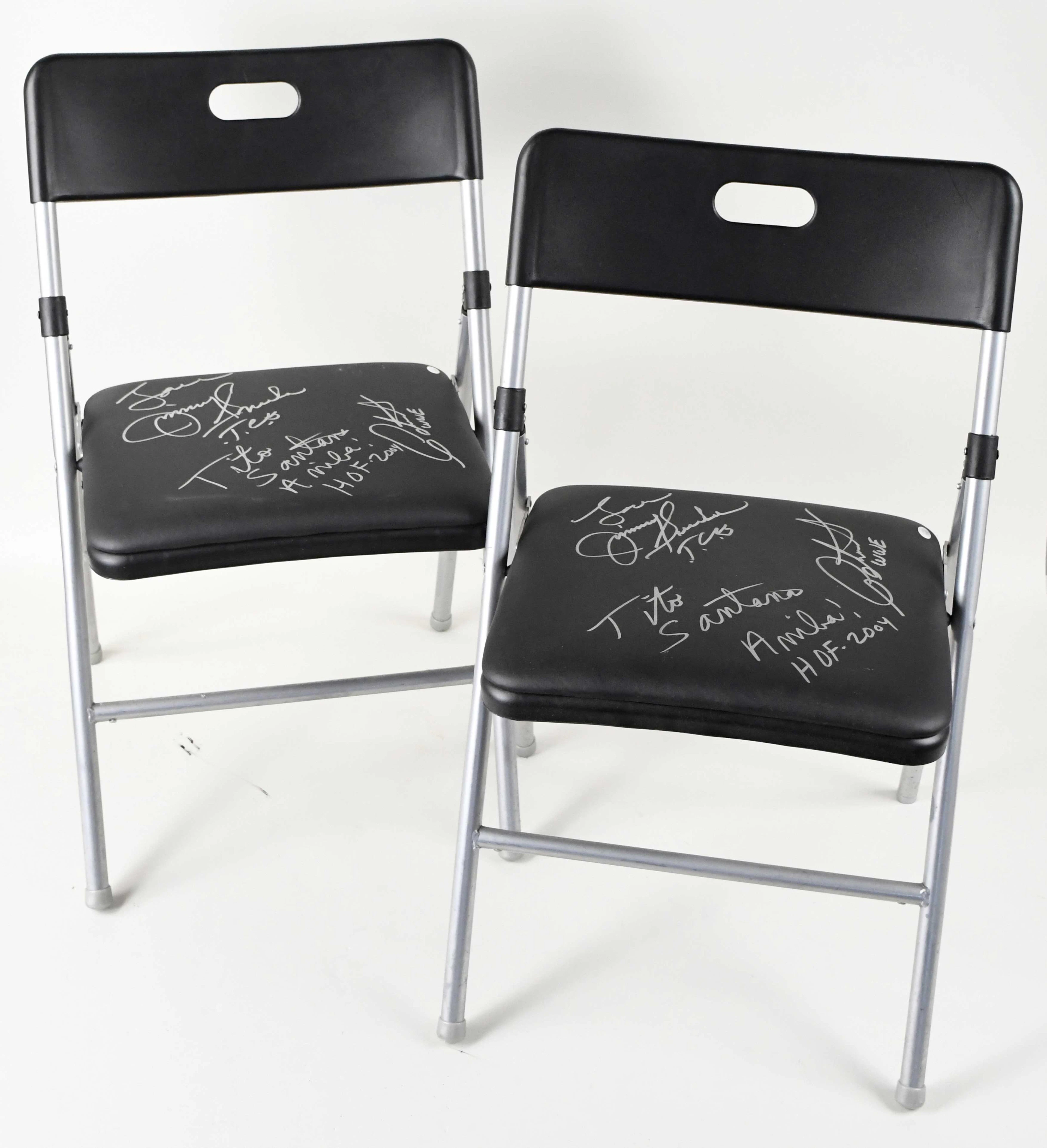 "Pair of Jimmy Snuka and Tito Santana autographed folding...