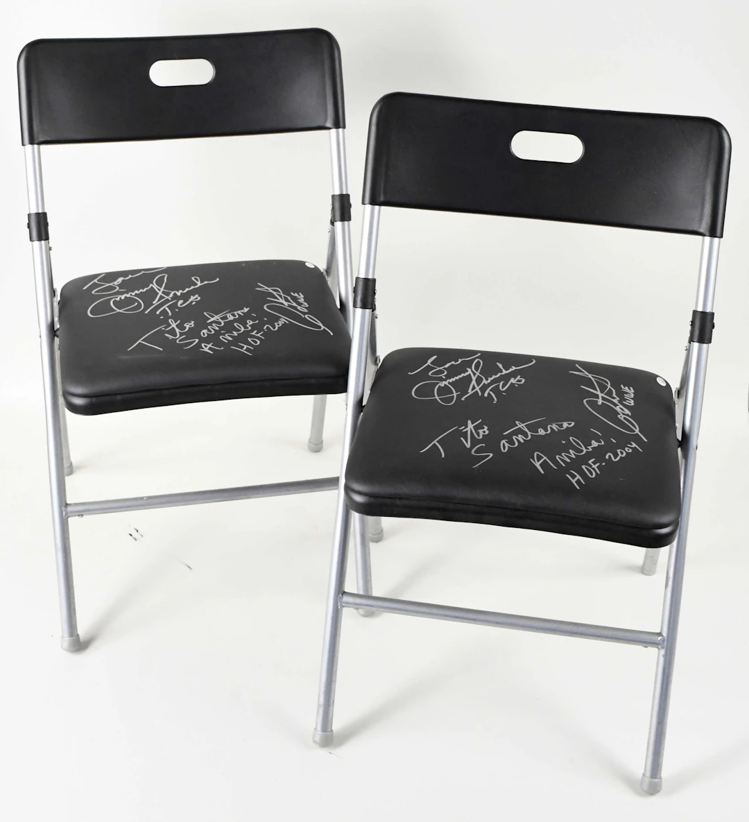 "Pair of Jimmy Snuka and Tito Santana autographed folding...