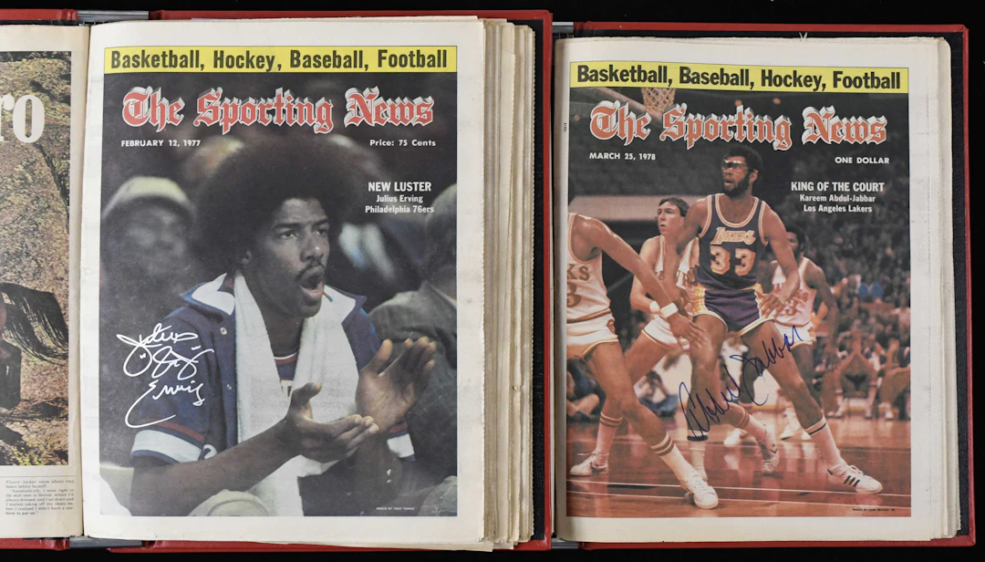 "Lot of (16) 1970s Sporting News autographed bound newspapers with Abdul-Jabbar