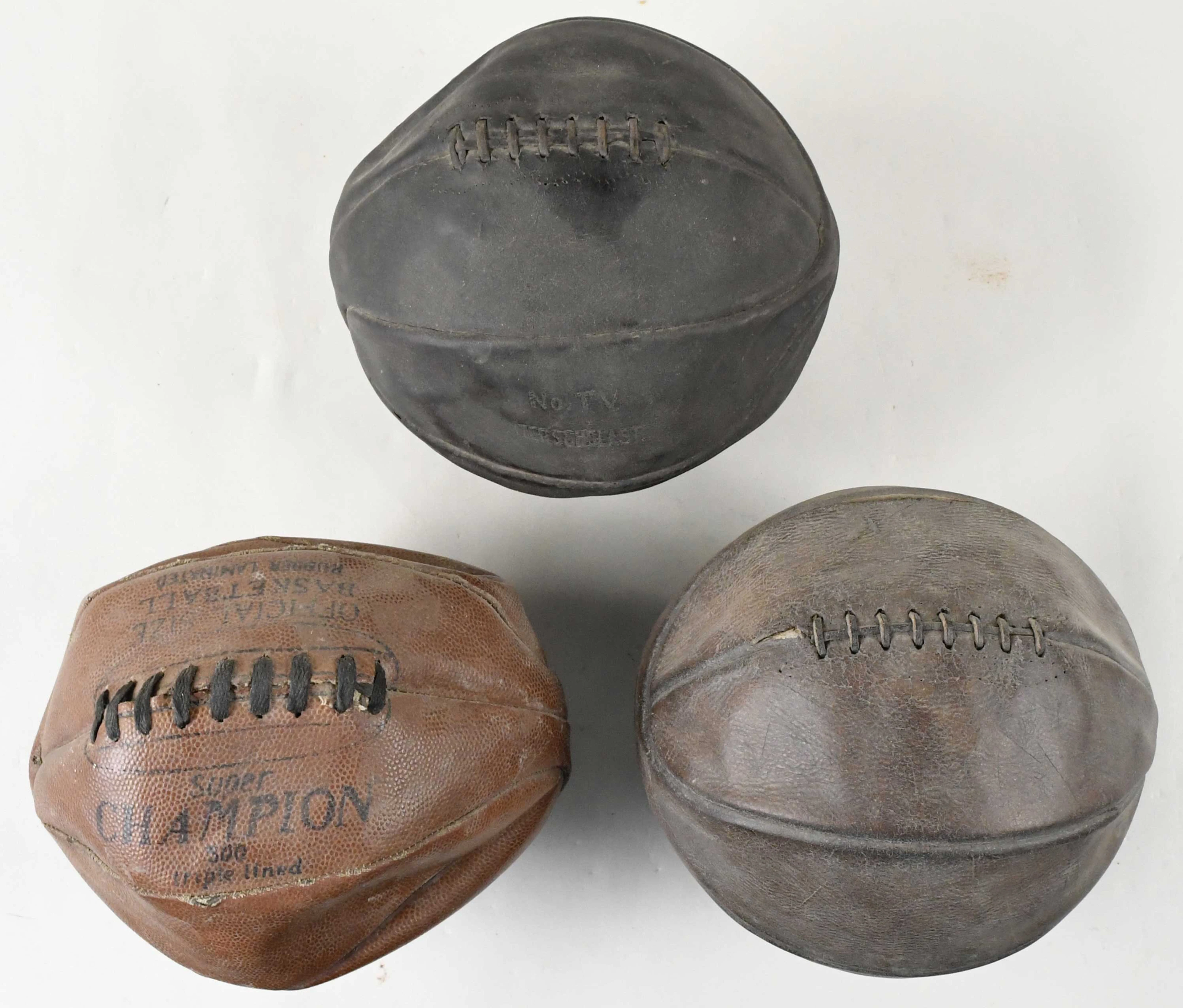 "Lot of (3) vintage laced basketballs