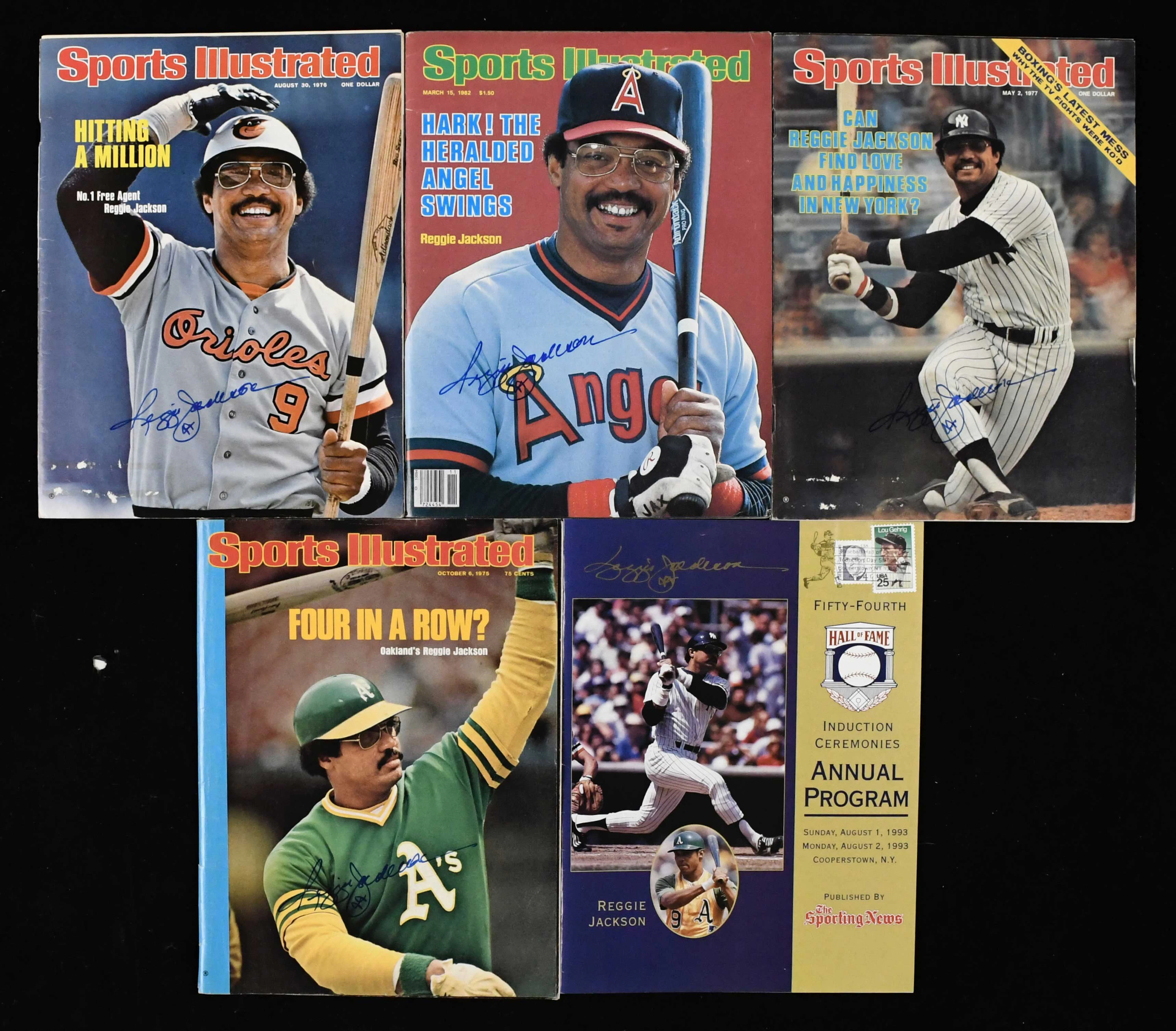"Lot of (5) Reggie Jackson autographed publications (Sigs