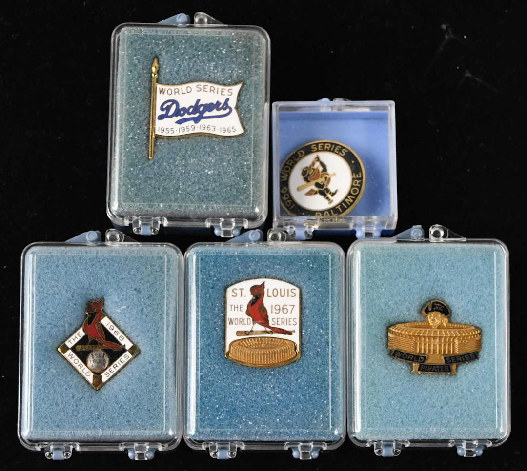 "Lot of (5) World Series press pins from 1966-1971 (EX/MT-NM/MT)