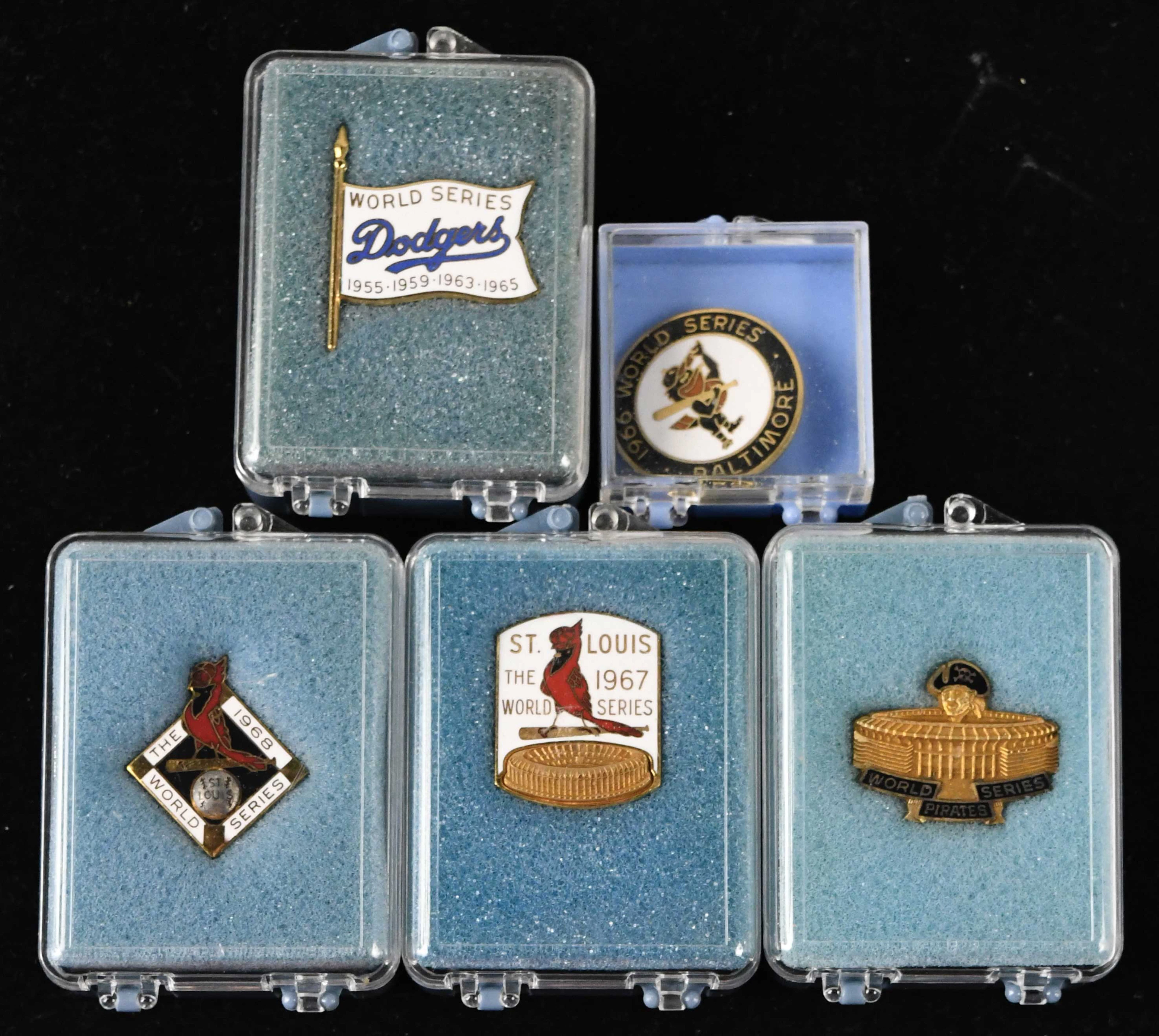 "Lot of (5) World Series press pins from 1966-1971 (EX/MT-NM/MT)