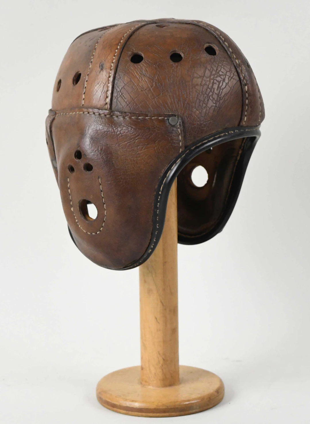 "Vintage fibre reinforced leather football helmet