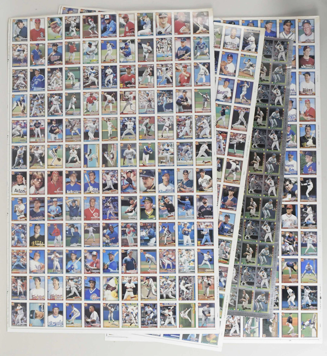"Lot of mostly baseball related uncut card sheets and...