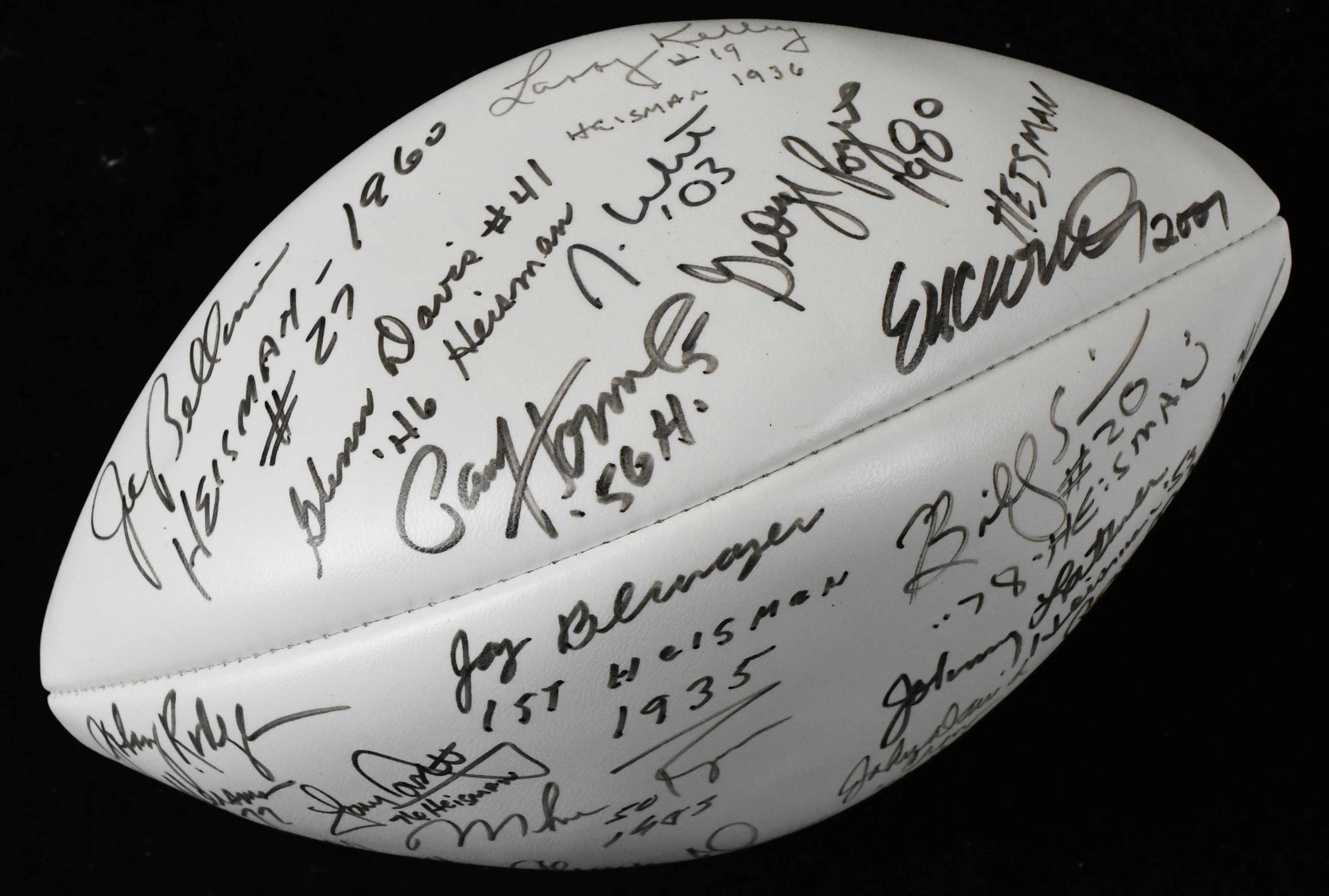 "Heisman Trophy winners multi-signed and inscribed football (NM)