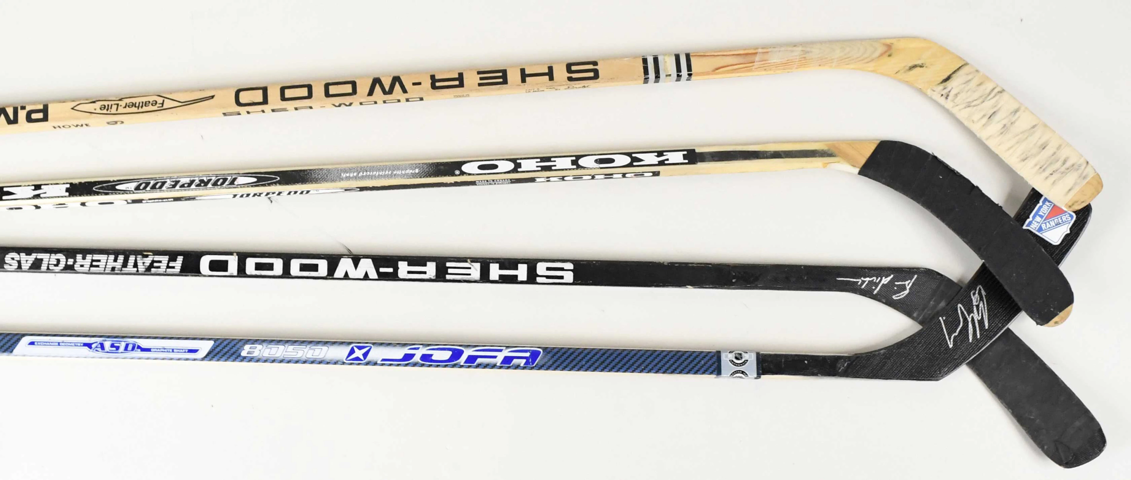"Lot of (13) pro stock & replica hockey sticks