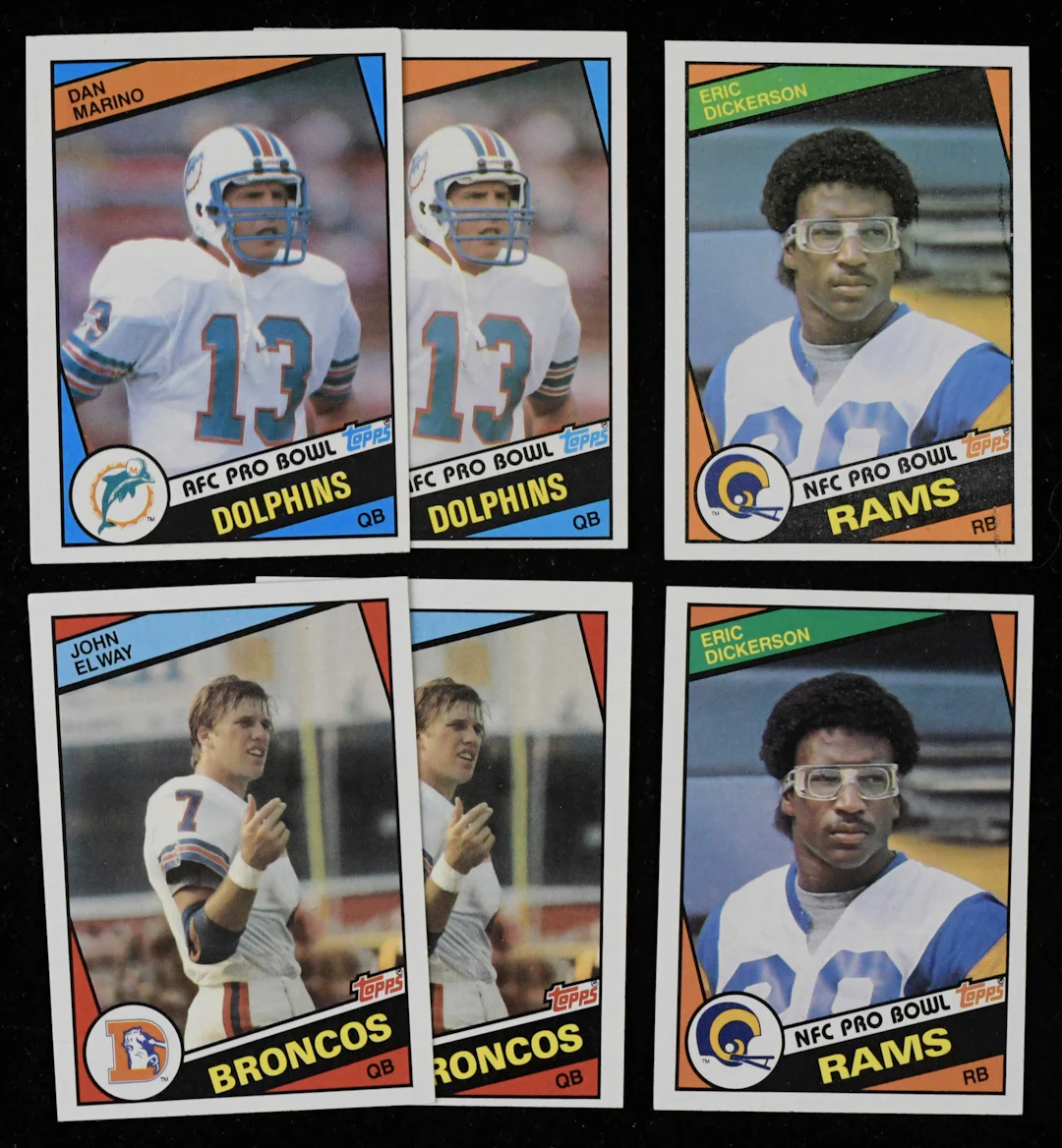 "Lot of (2) 1984 Topps football complete sets with Marino and Elway RCs (VG-MT)