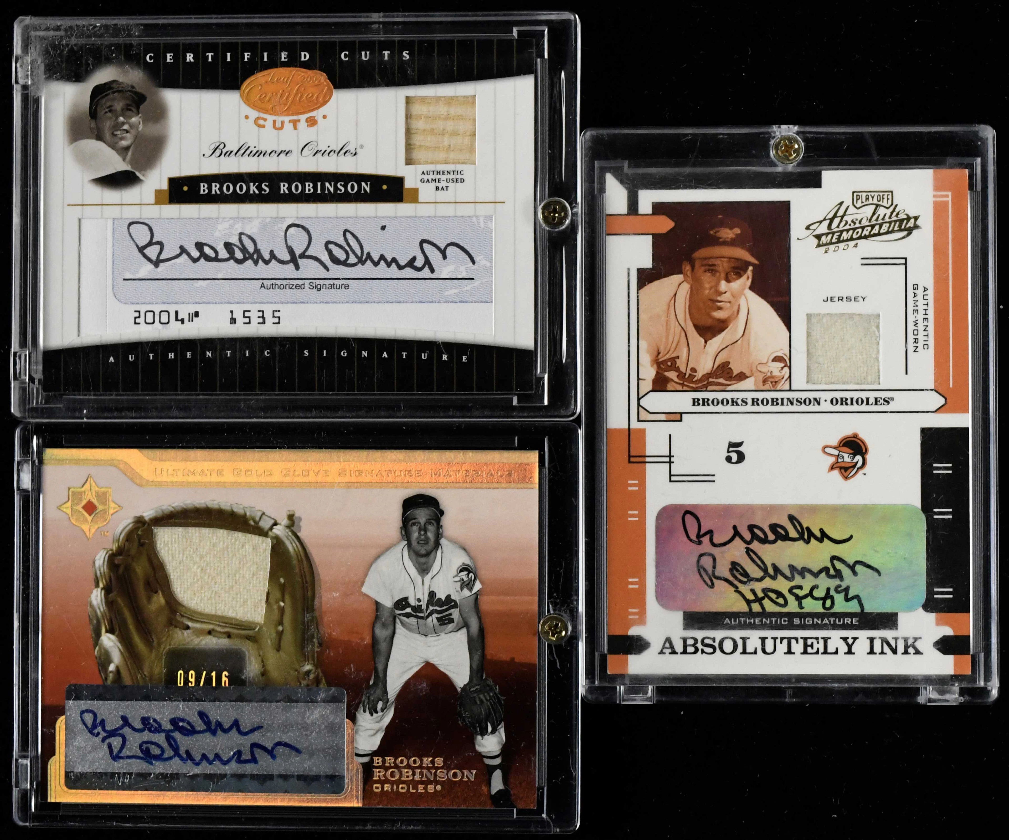 "Lot of (3) Brooks Robinson signed serial numbered relic insert cards (NM-NM/MT)