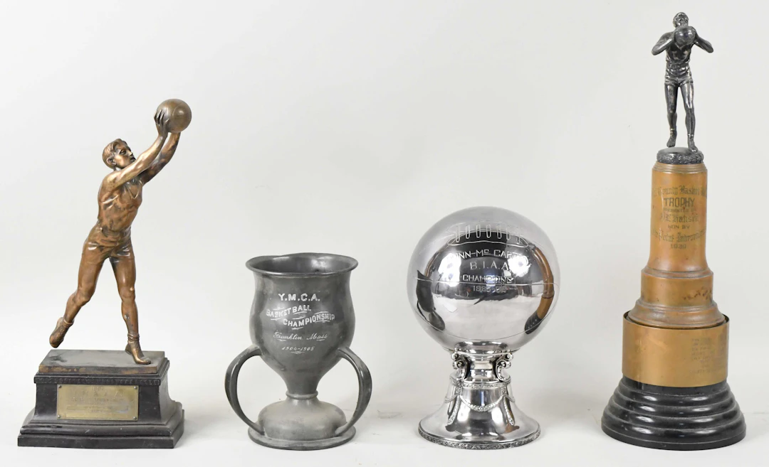 "Lot of (4) vintage basketball trophies from 1905-1939 (VG/EX-EX/MT)