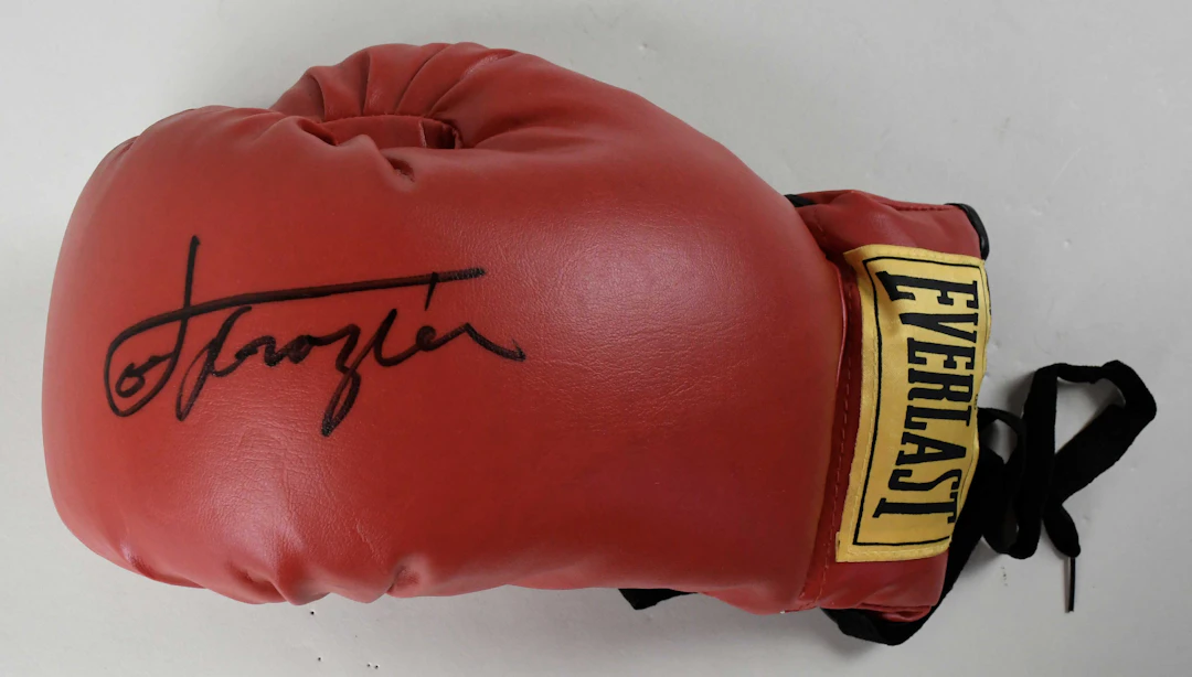 Joe Frazier signed Everlast boxing glove (NM)