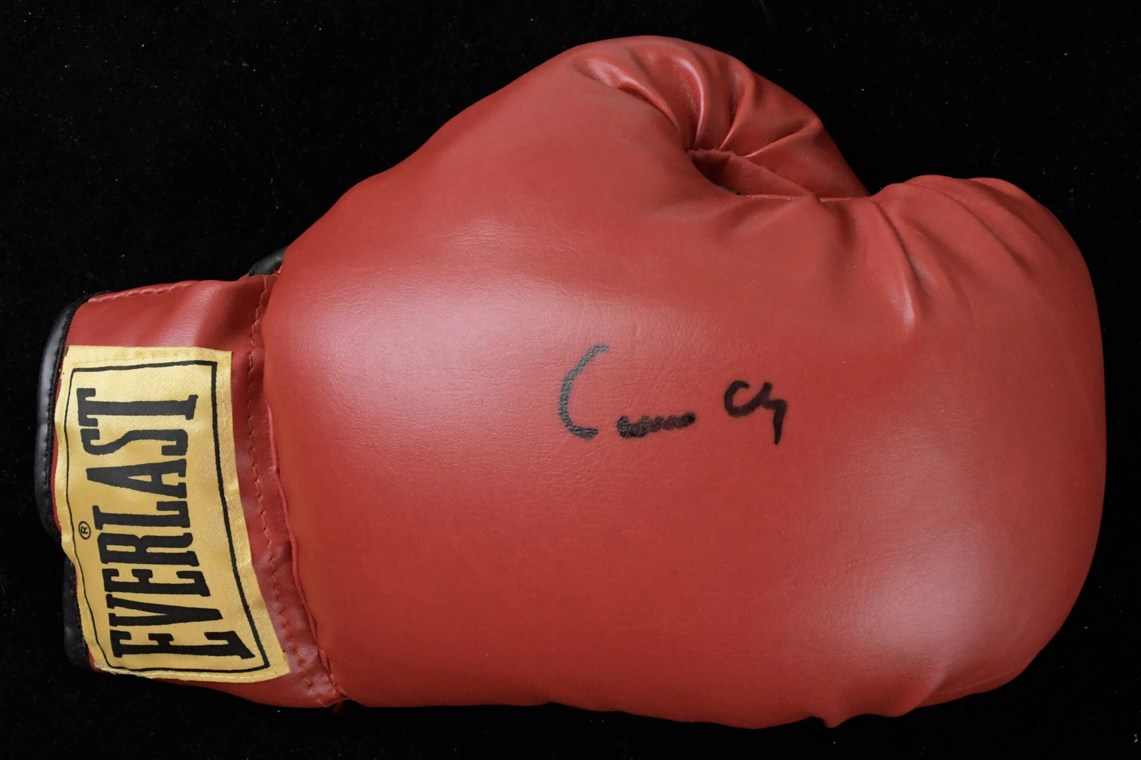 "Muhammad Ali autographed ""Cassius Clay"" boxing glove - JSA (NM)