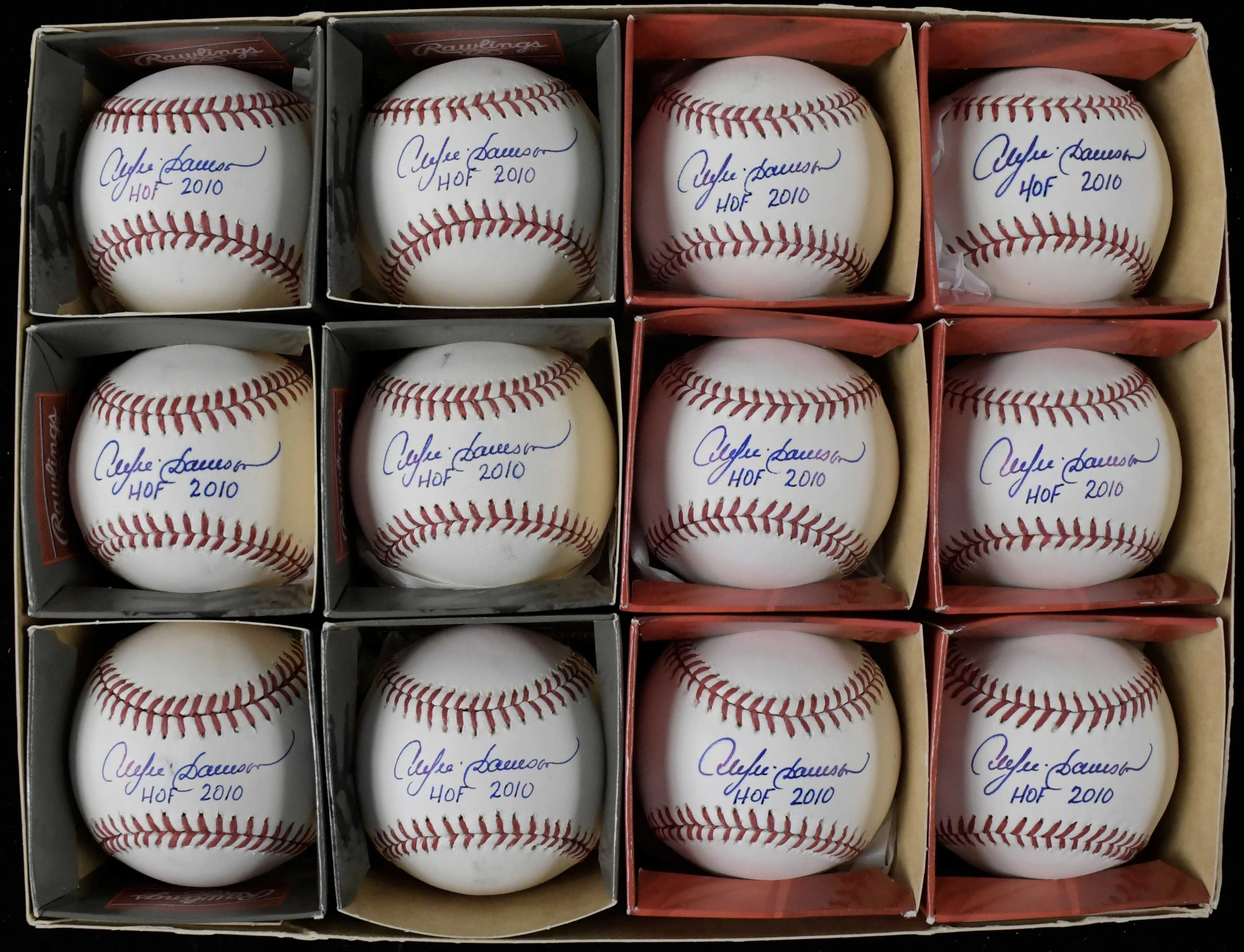 "Lot of (12) Andre Dawson signed & inscribed Rawlings OML baseballs (EX-NM/MT)