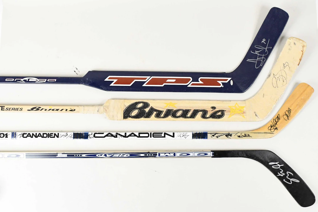 "Lot of (12) pro stock & replica hockey sticks