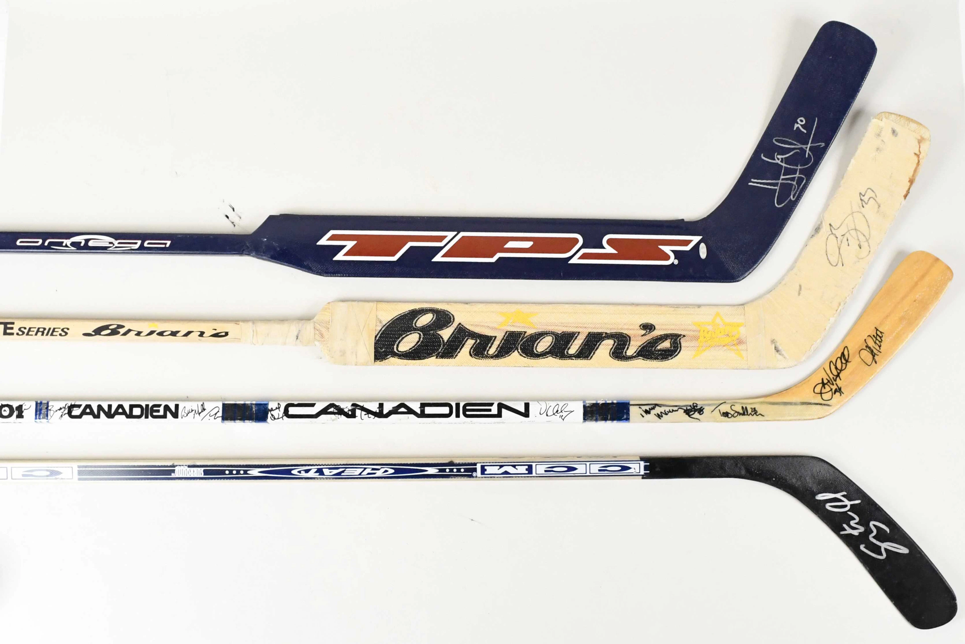 "Lot of (12) pro stock & replica hockey sticks