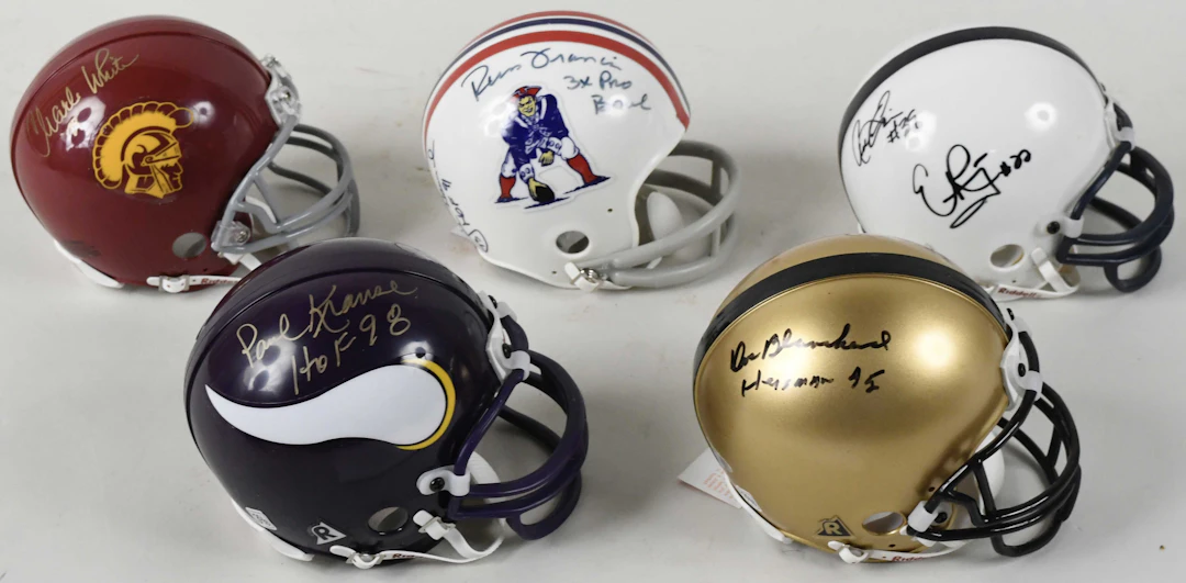"Lot of (5) signed football mini helmets (NM-NM/MT)