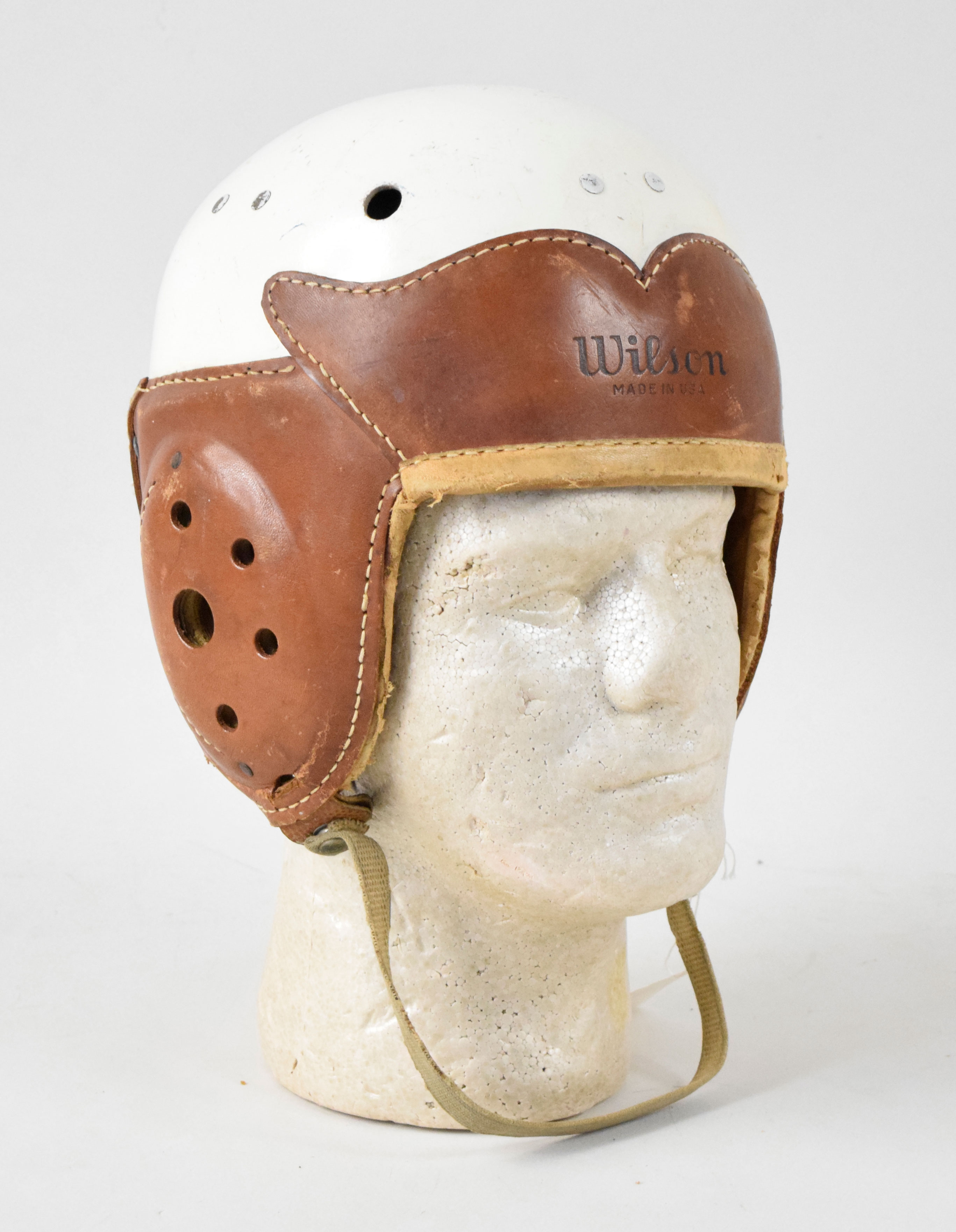 Vintage football helmet by Wilson | Barnebys