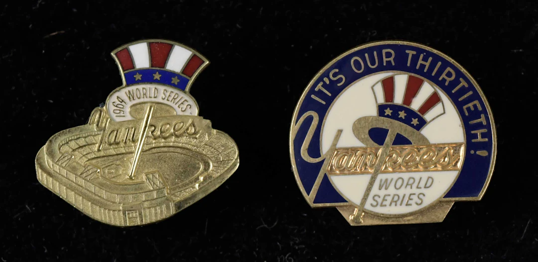 "New York Yankees 1964 and 1976 World Series press pins (EX/MT-NM)