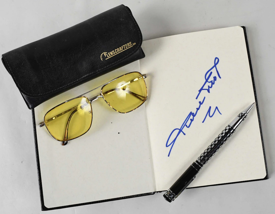 "Willie Mays autographed notebook with his glasses and...