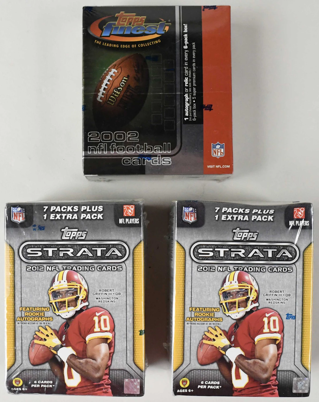 "Lot of (3) 2002-2012 Topps FB factory-sealed blaster boxes